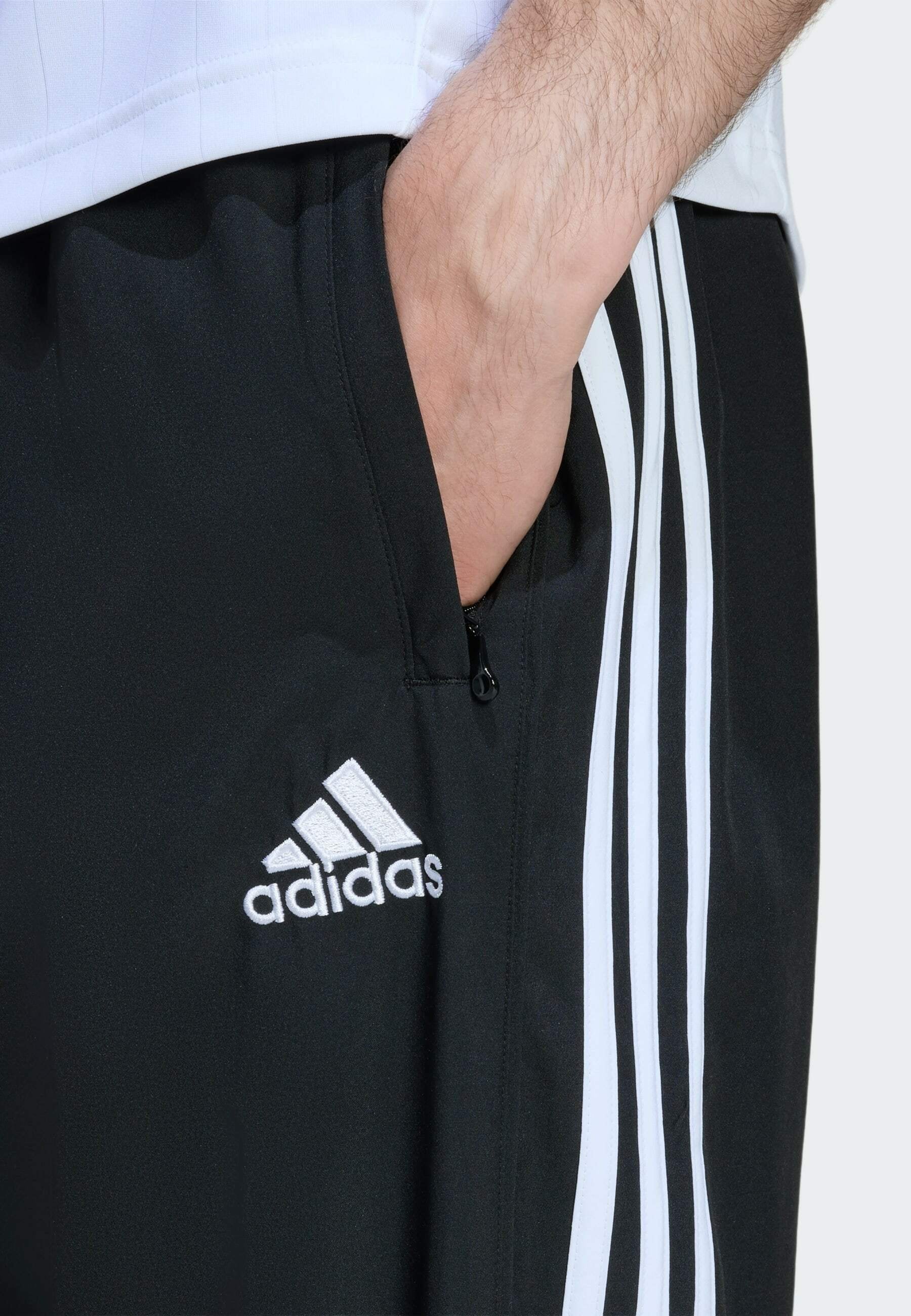 TEAMGEIST - Tracksuit bottoms - black   black   white