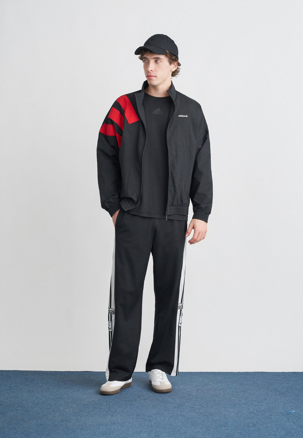 ARCH - Training jacket - black/better scarlet