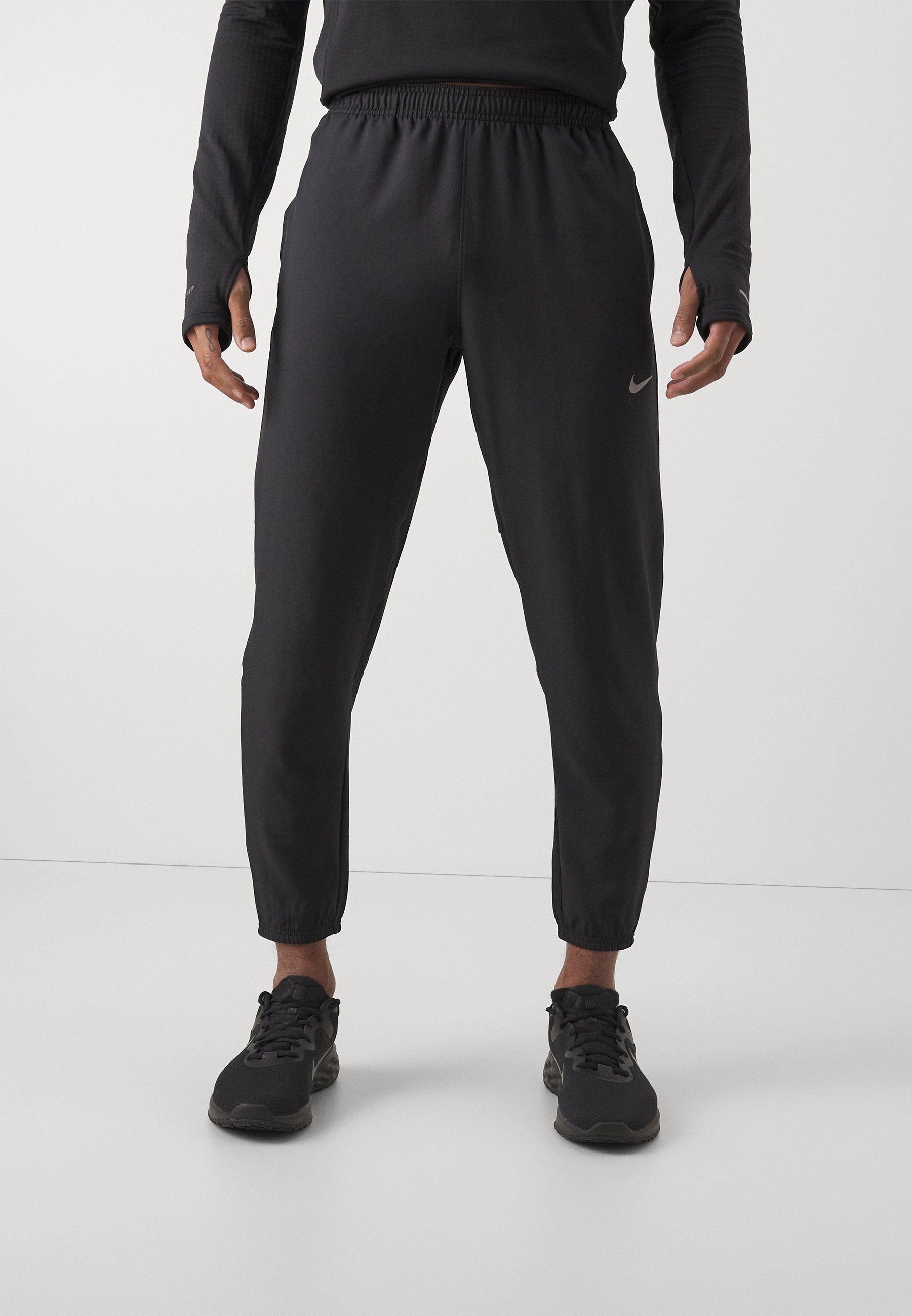 M NK DF CHALLENGR WVN PANT - Tracksuit bottoms - black/silver