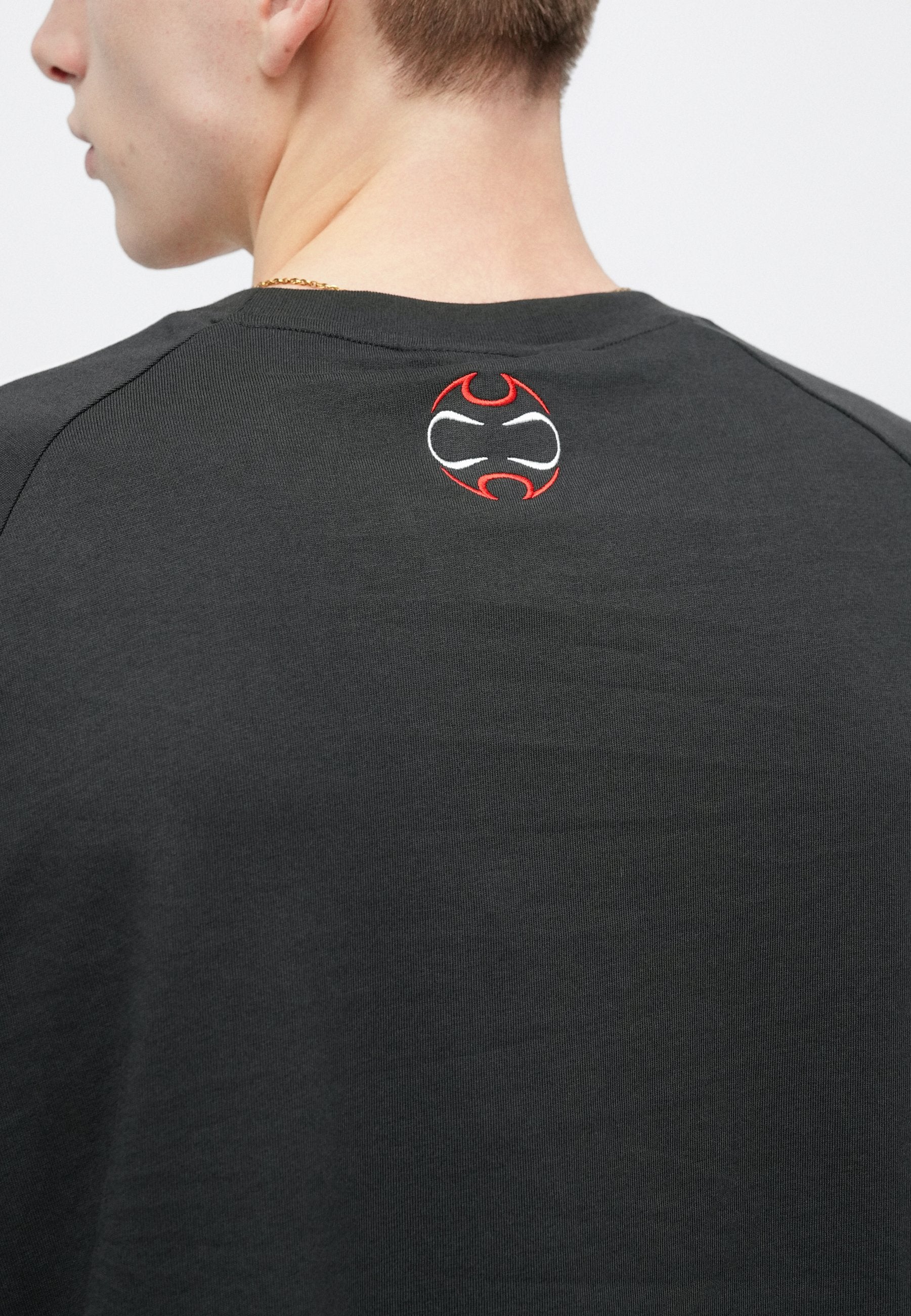TEAMGEIST TEE - Print T-shirt - black/better scarlet