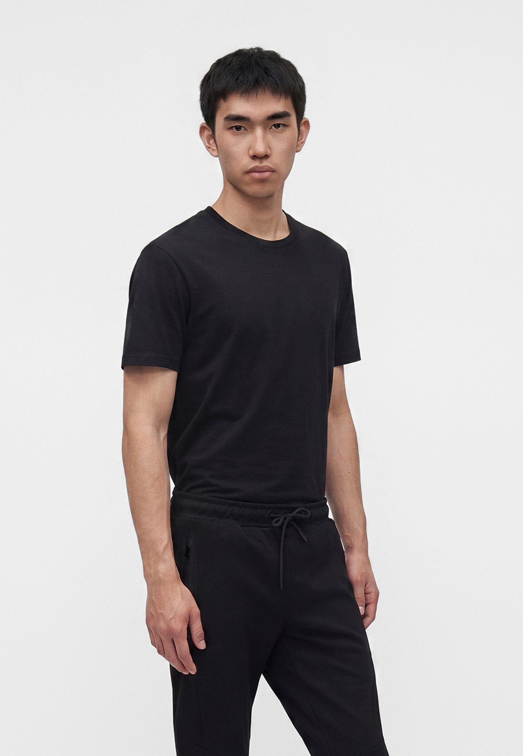 Slim Fit - Tracksuit bottoms - black