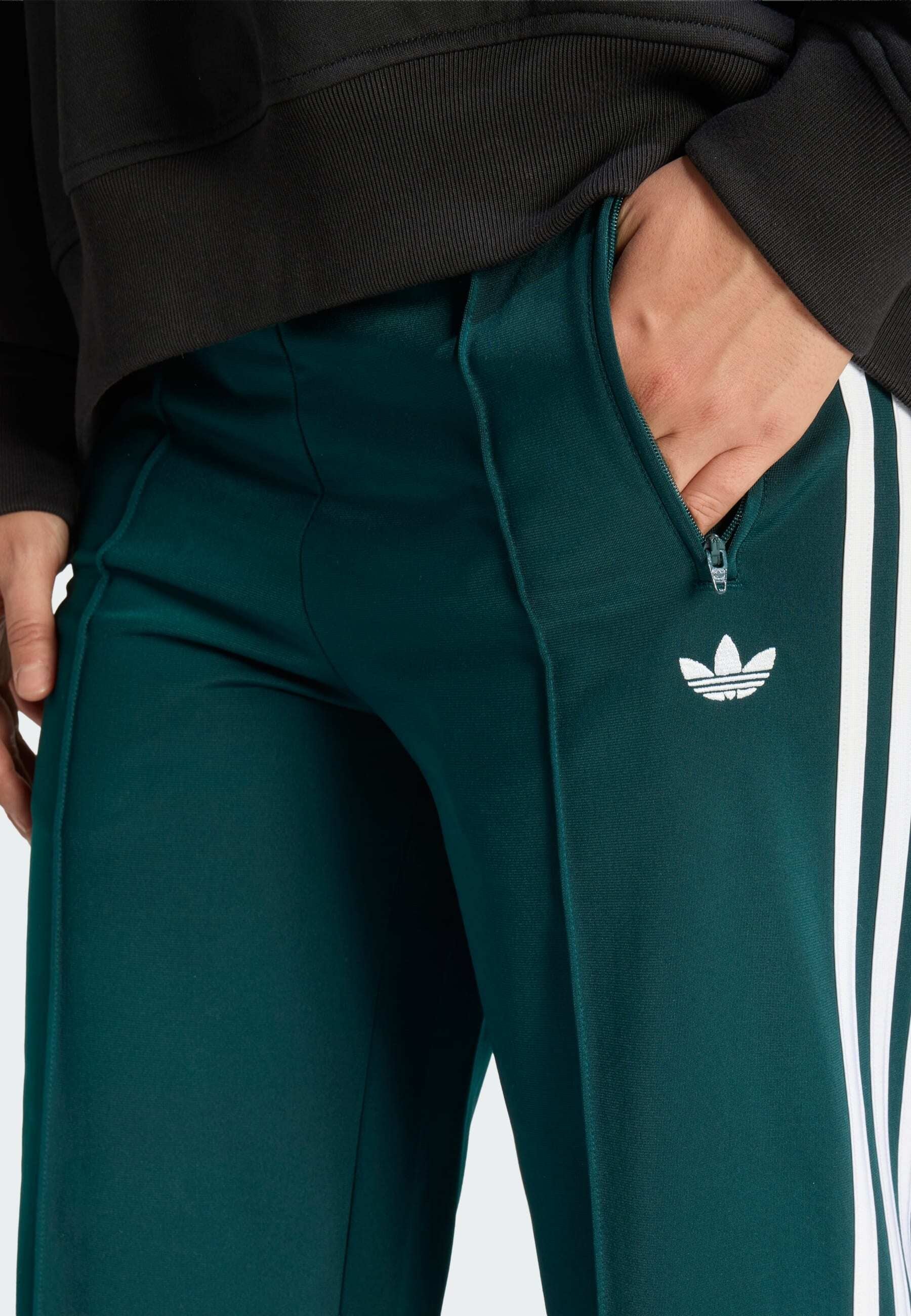 FIREBIRD LOOSE TRACKSUIT PANTS - Tracksuit bottoms - legacy teal/off white