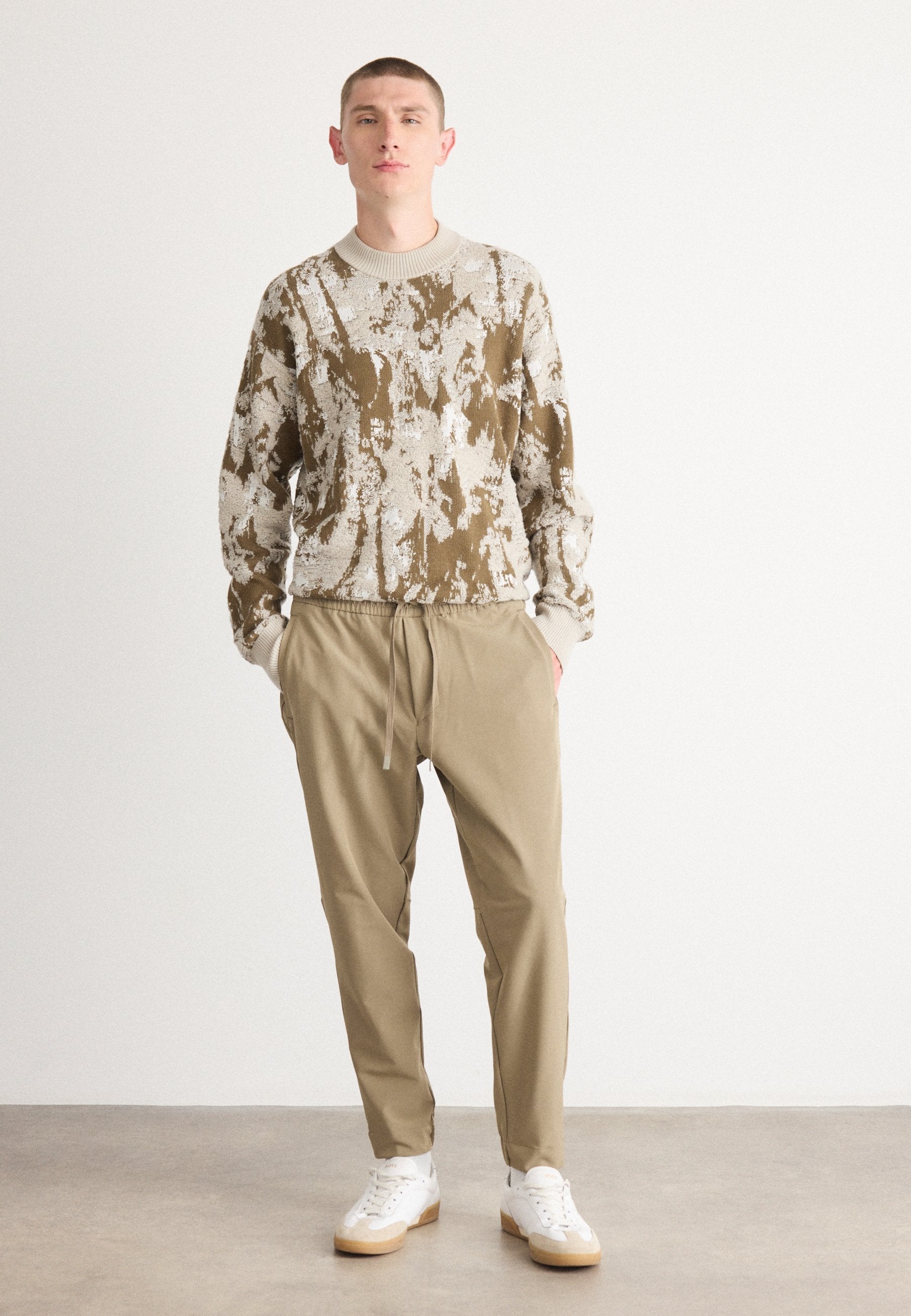 T_FLEX - Trousers - light/pastel green