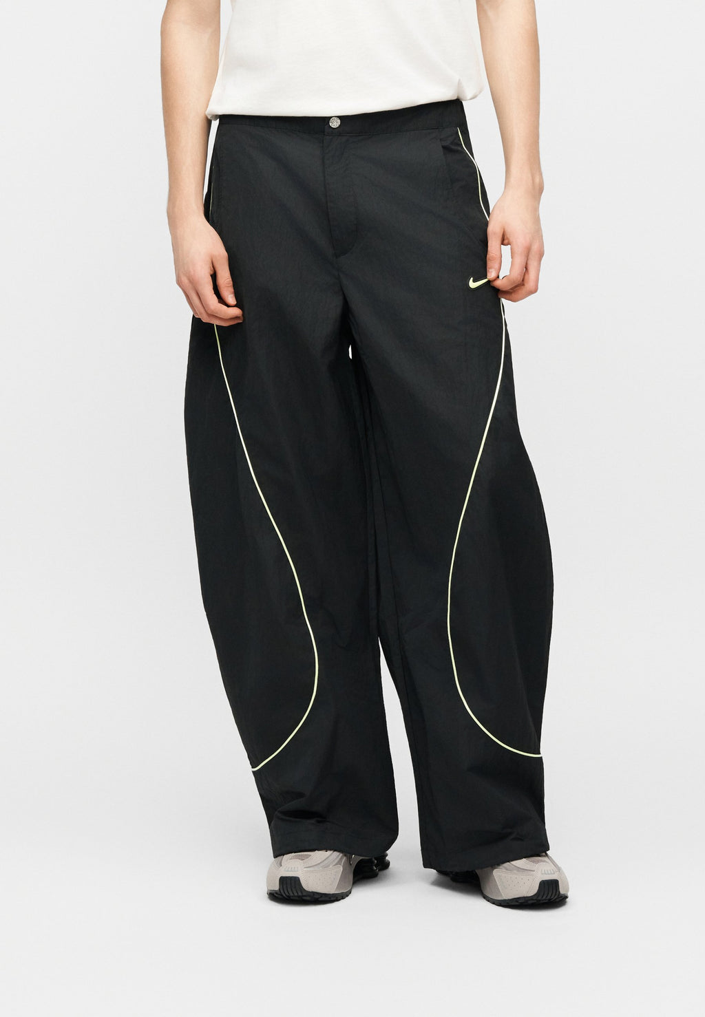 TOBI - Tracksuit bottoms - black/volt ice/cream