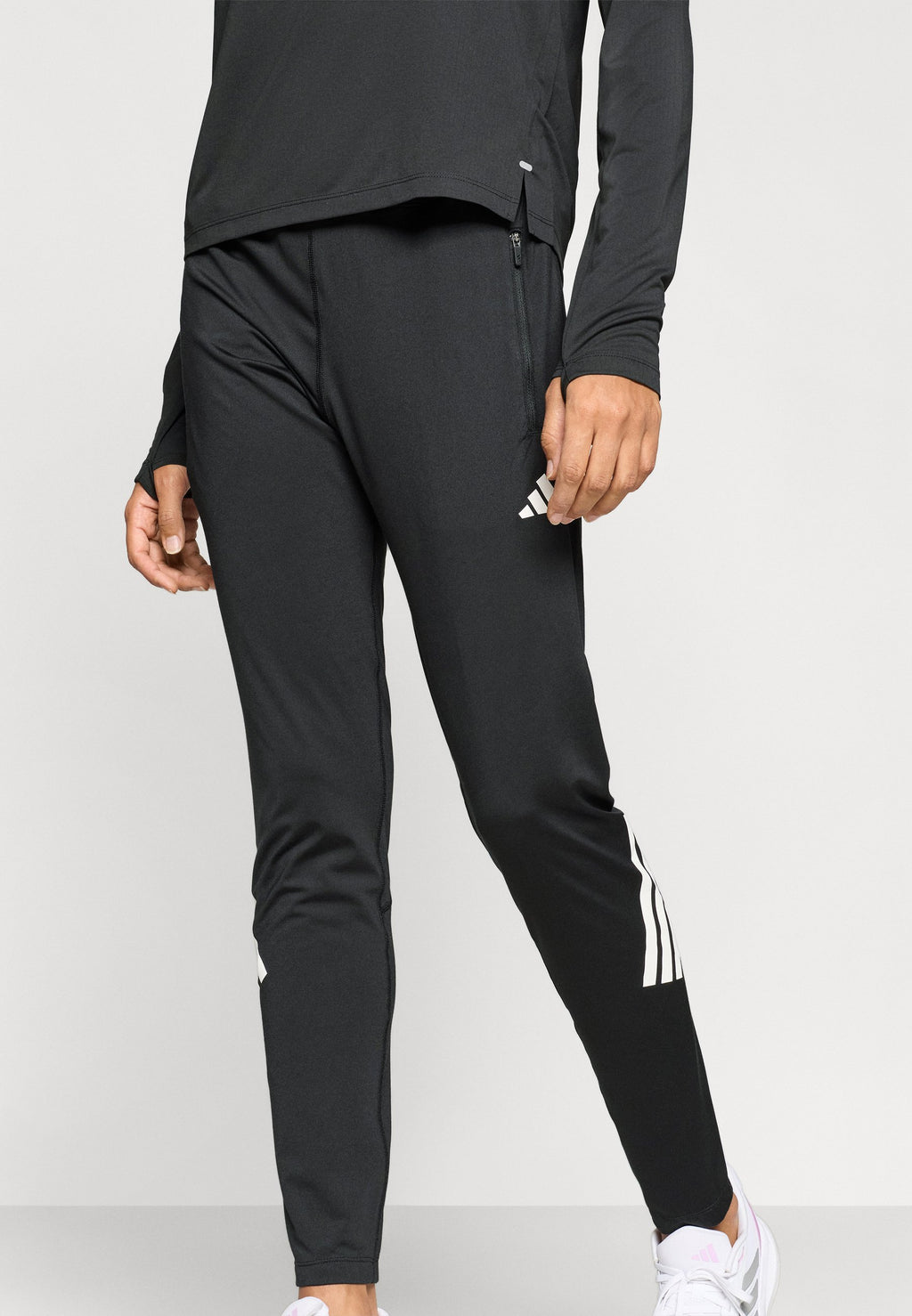 ADI365 - Tracksuit bottoms - black