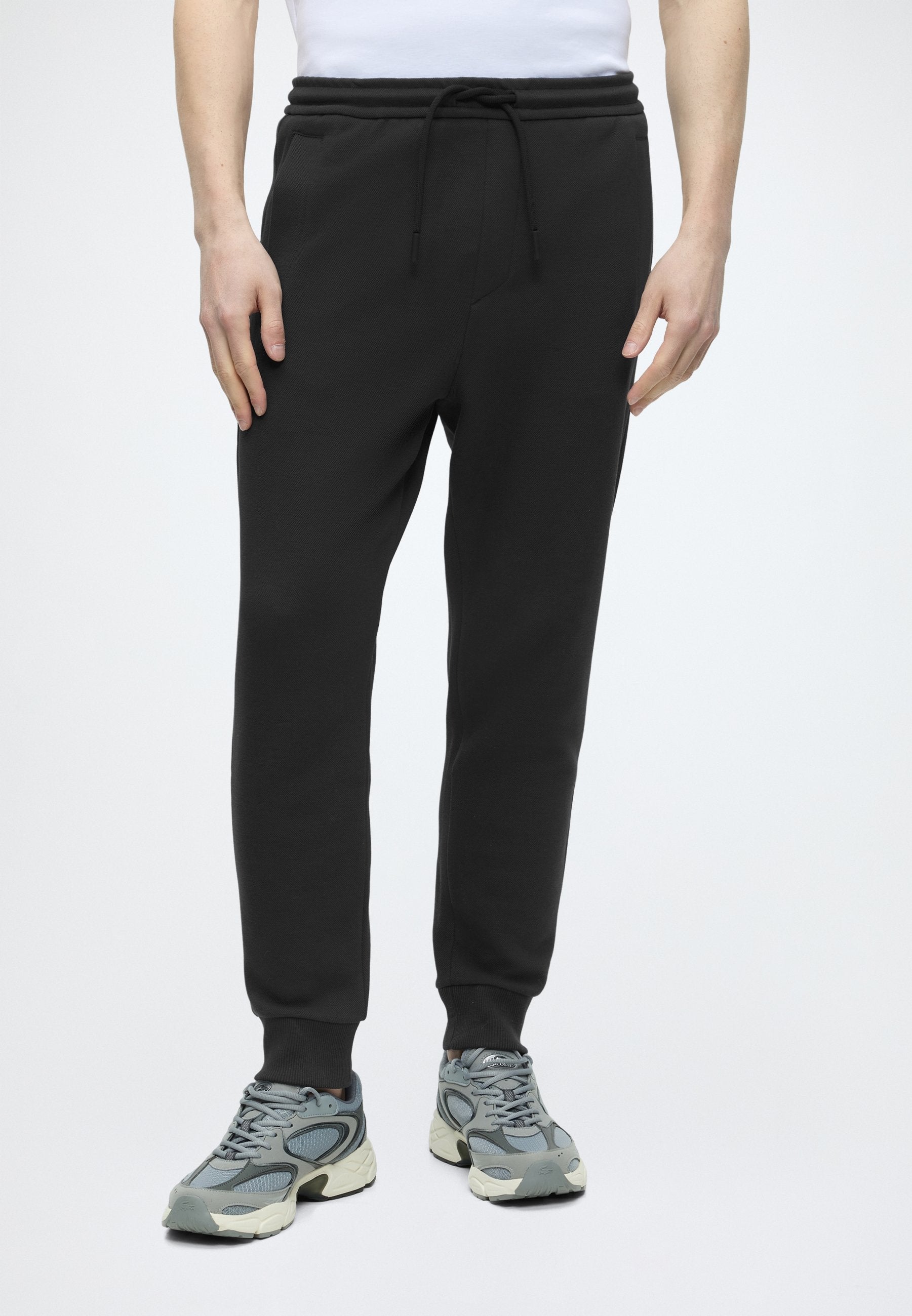 UNION HADIKO - Tracksuit bottoms - dark blue