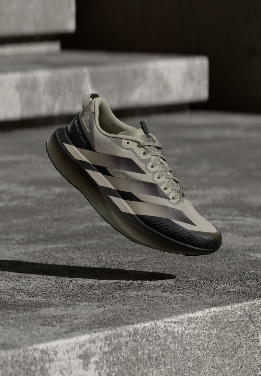 ADIZERO EVO SL ATR - Trainers - light brown/silver-coloured pebble