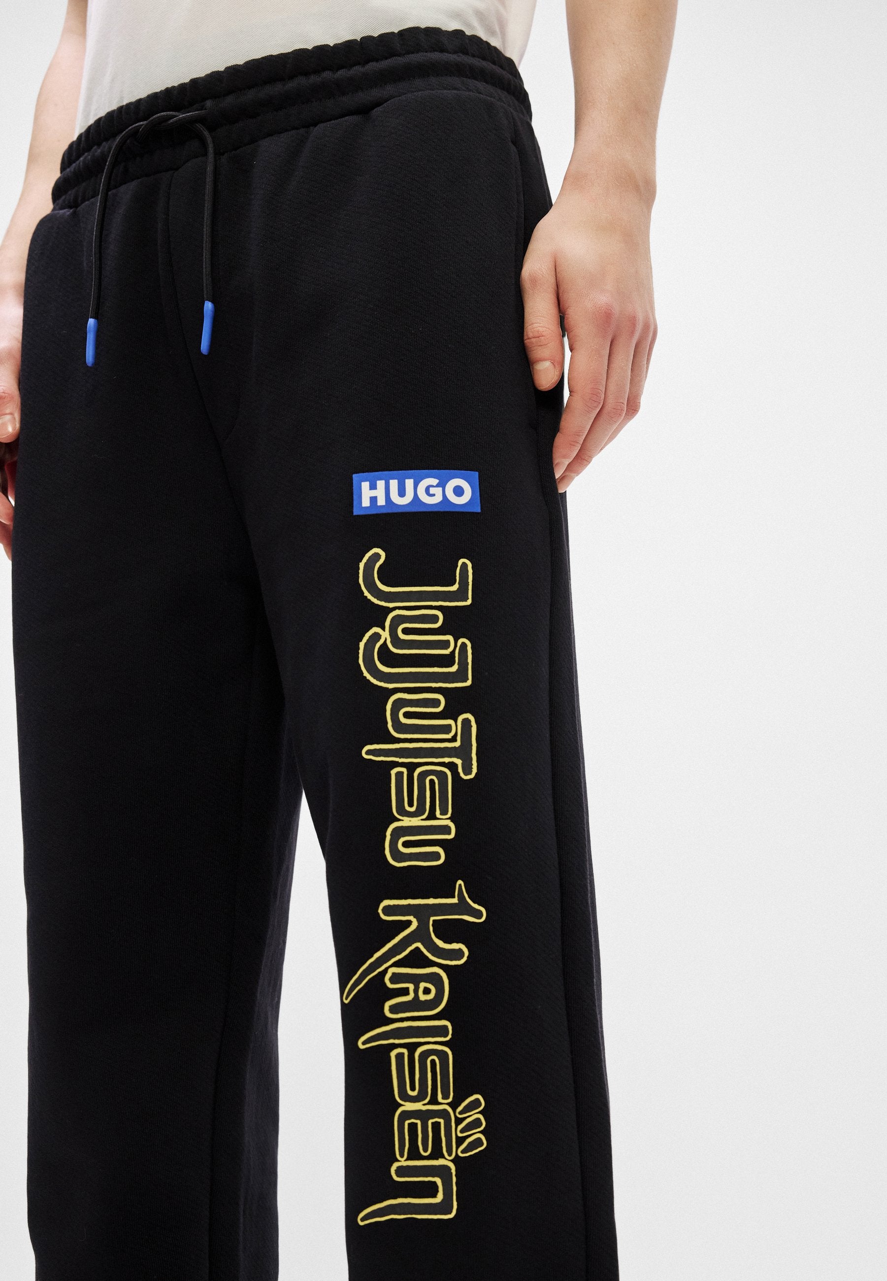 X JUJUTSU KAISEN NIMAYTRO - Tracksuit bottoms - black