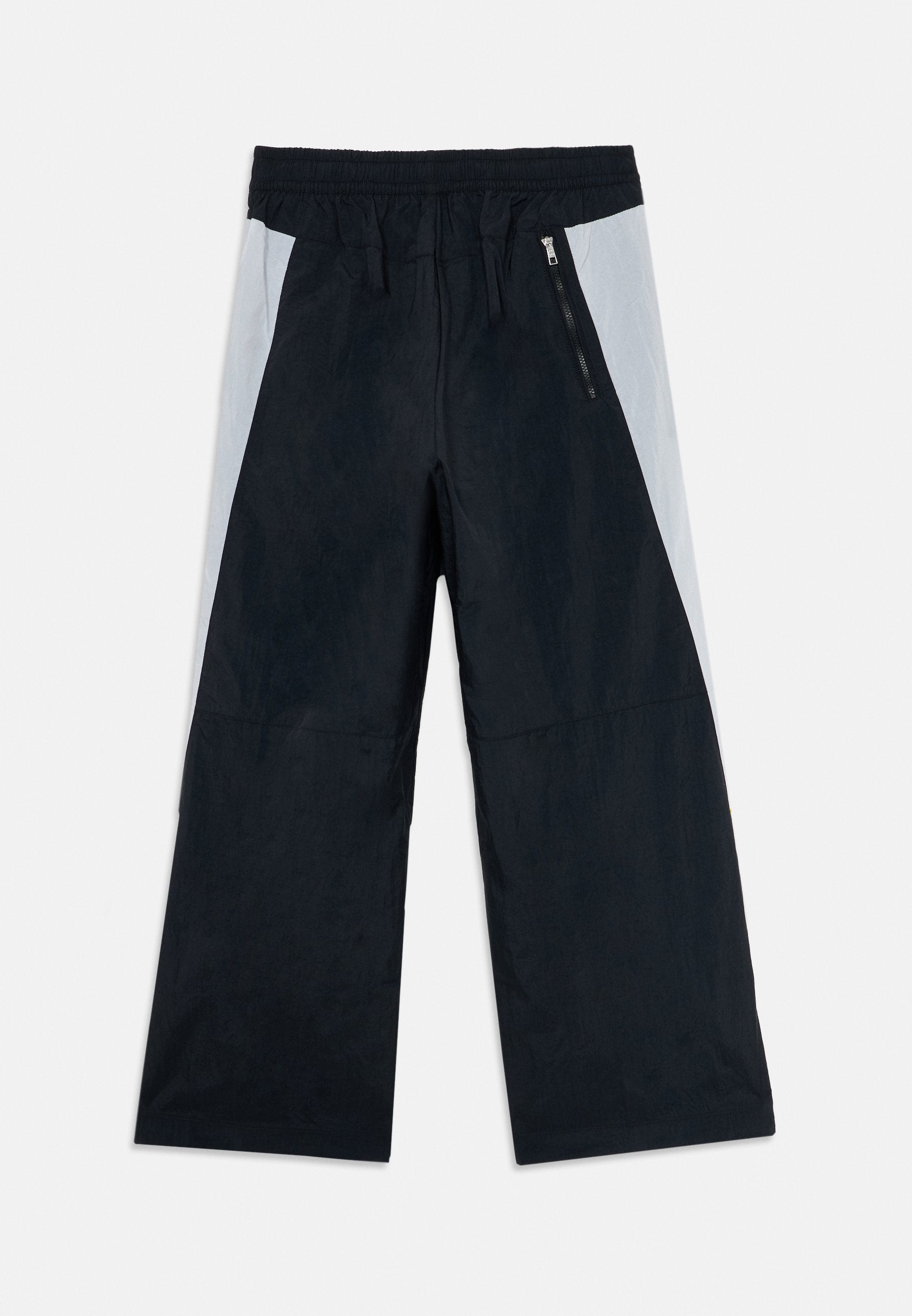 AIR TRACK UNISEX - Tracksuit bottoms - black/white