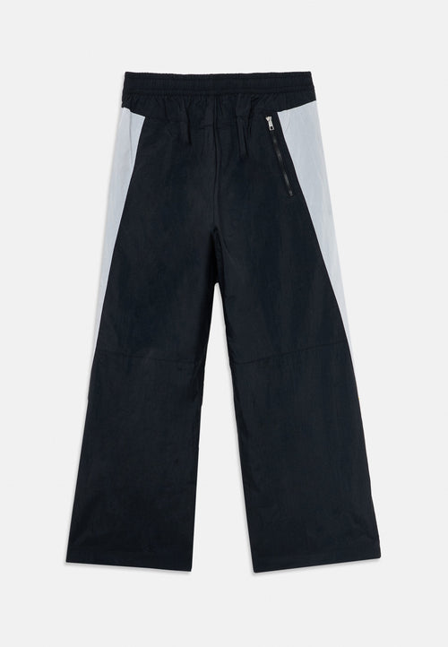 AIR TRACK UNISEX - Tracksuit bottoms - black/white