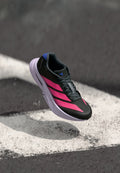 ADIZERO BOSTON - Road running shoes - core black/lucid pink/cobalt blue