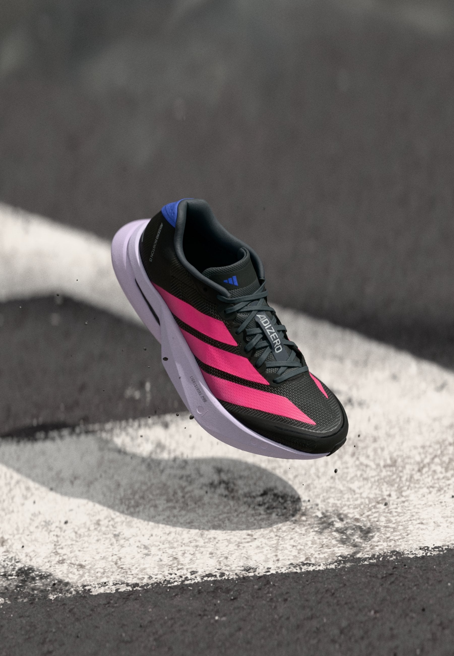 ADIZERO BOSTON - Road running shoes - core black/lucid pink/cobalt blue