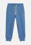 SHIELD UNISEX - Tracksuit bottoms - salty sea
