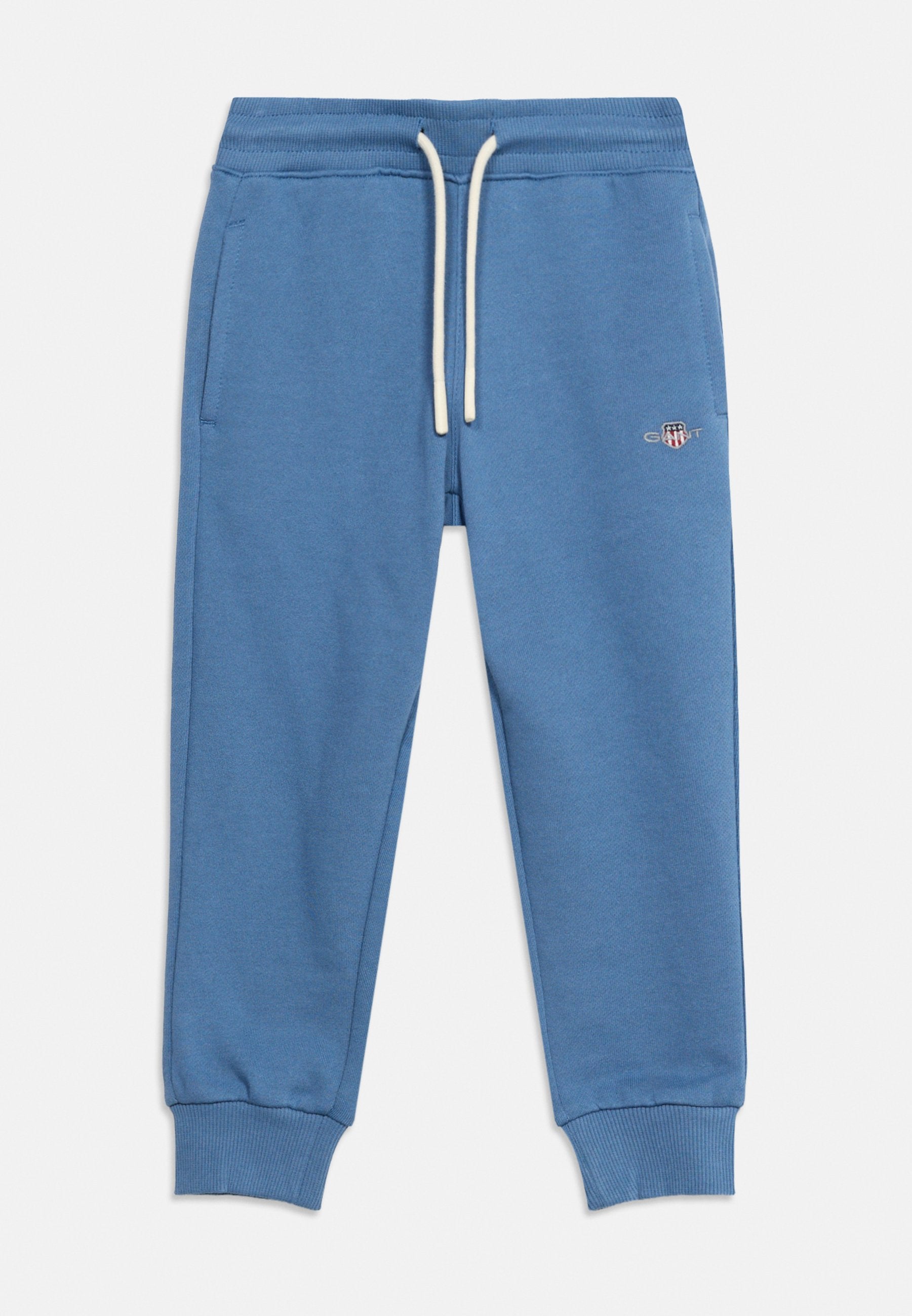 SHIELD UNISEX - Tracksuit bottoms - salty sea