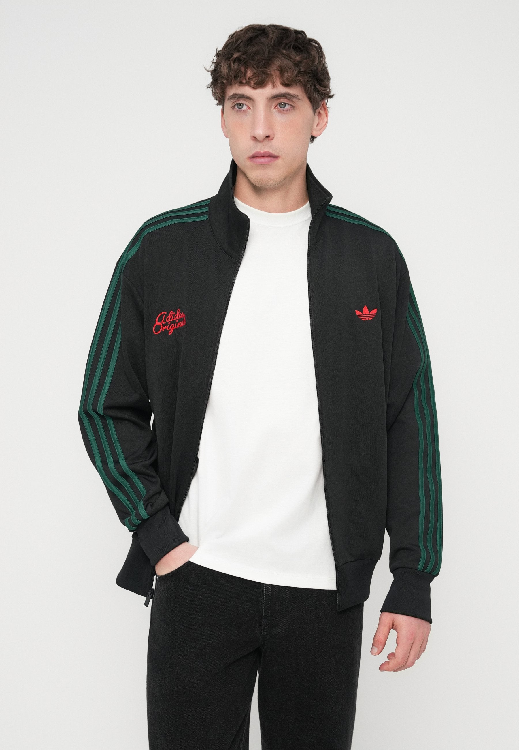 TRACK - Sweat-shirt zippé - noir/vert universitaire