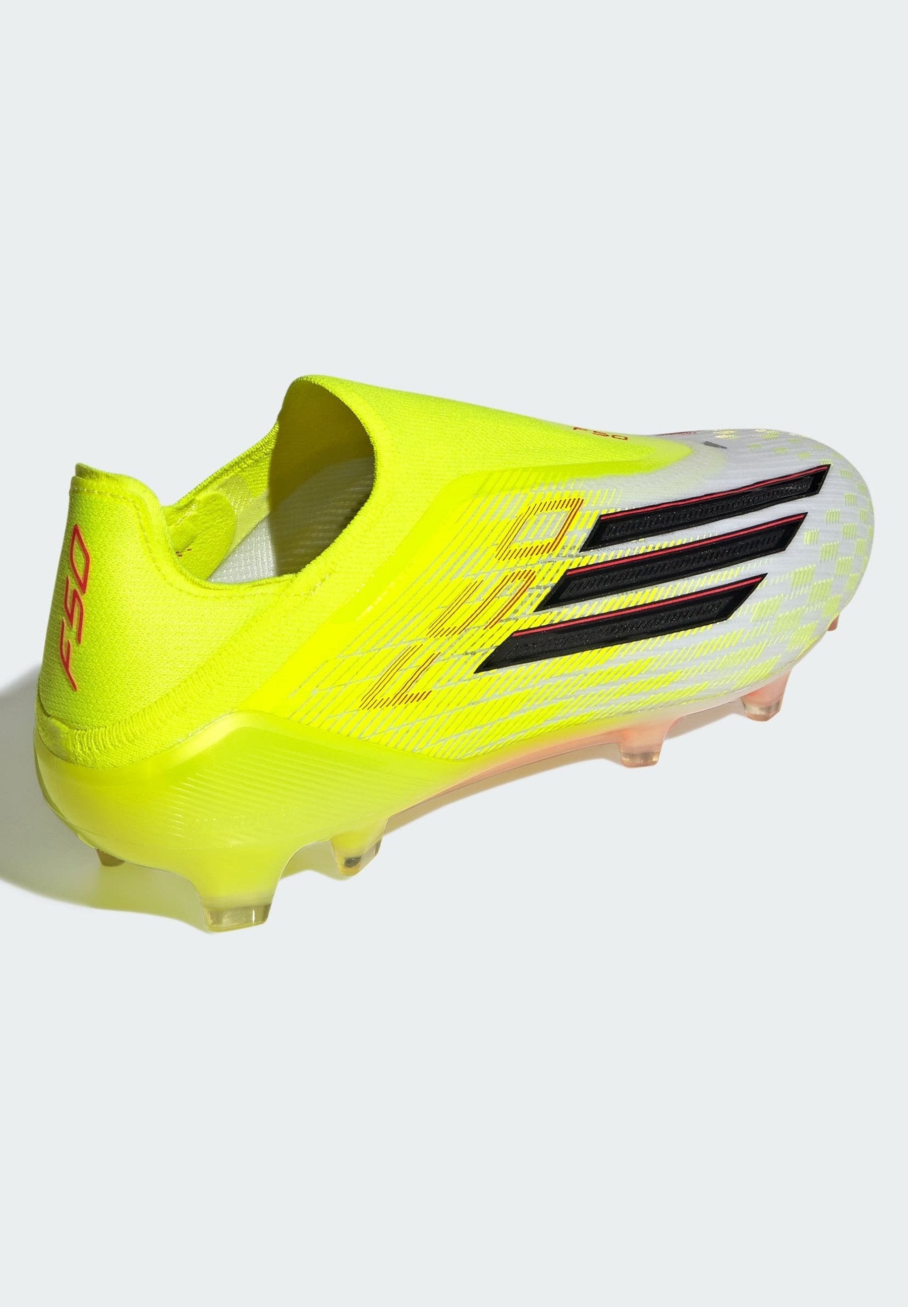 F50 ELITE LACELESS FG - Chaussures de football pour terrain sec - jaune solaire/noir/rouge vif