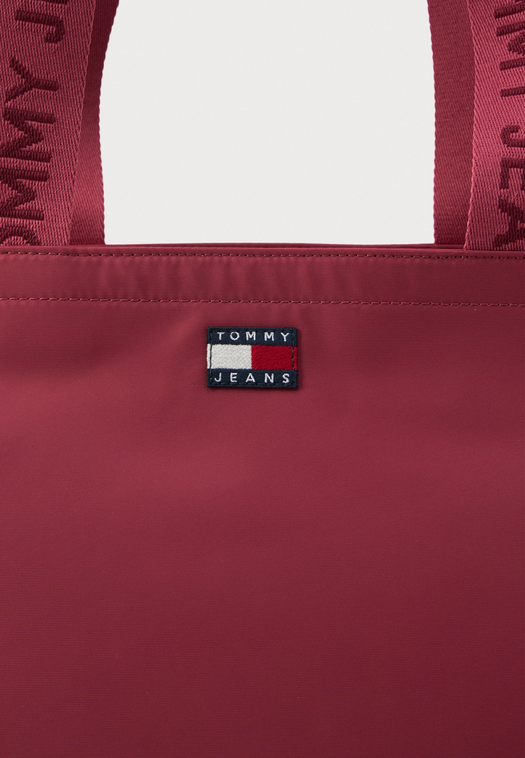 ESSENTIAL REPEAT LOGO CROSSBODY BAG - Tote bag - ruby dusk