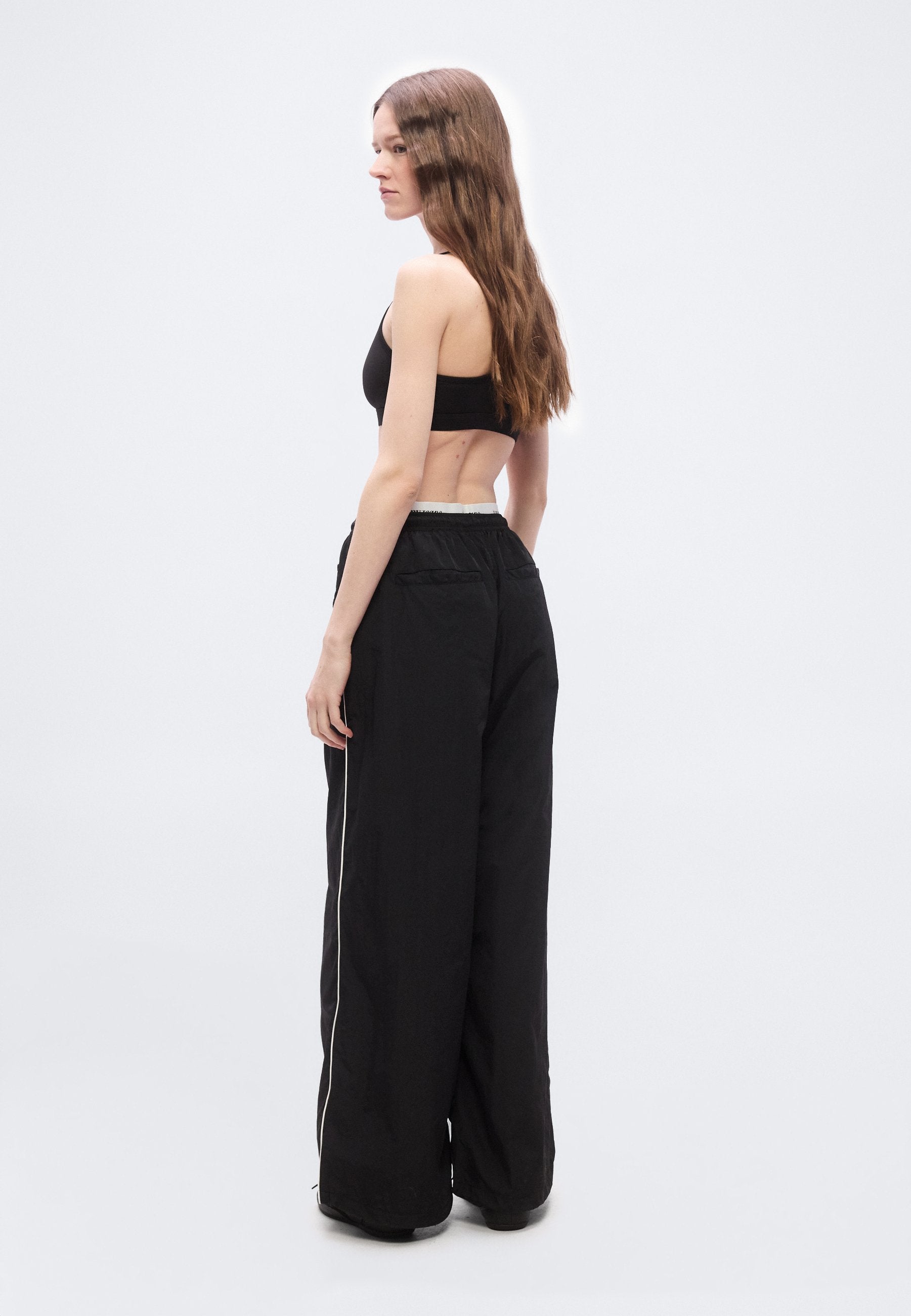 REPEAT LOGO TAPE WIDE LEG JOGGERS - Tracksuit bottoms - black