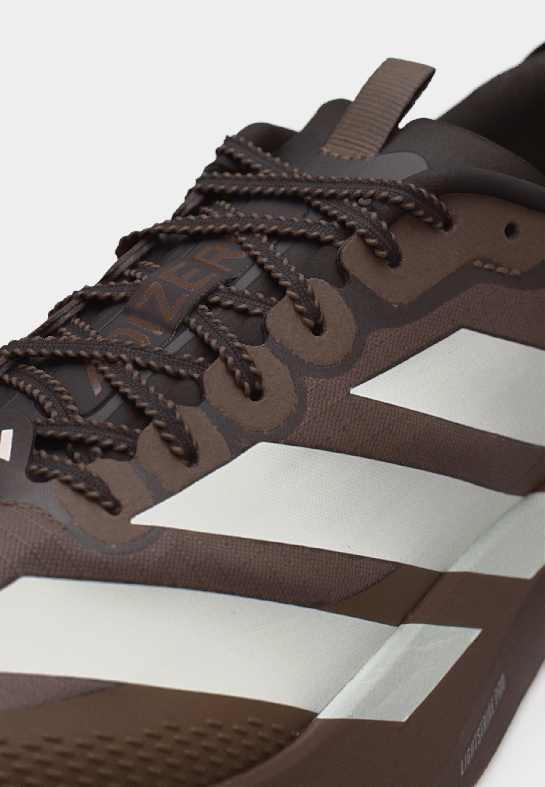 ADIZERO EVO SL ATR M - Trainers - earth strata/off white/warm sandstone