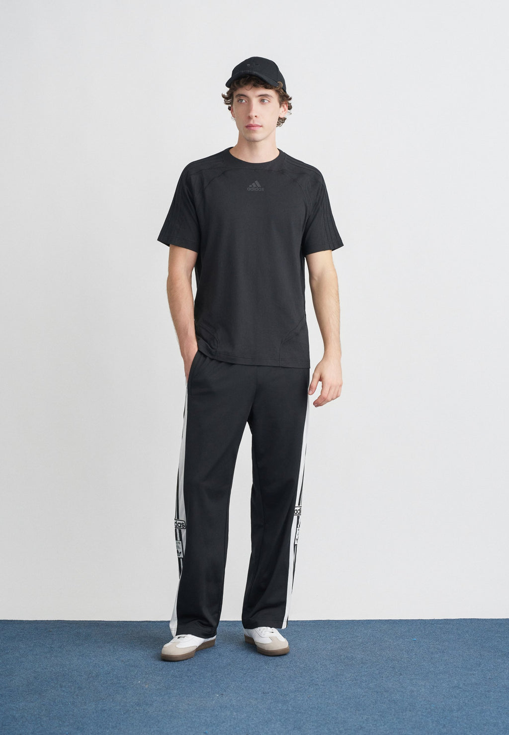 ADIBREAK UNISEX - Tracksuit bottoms - black/white