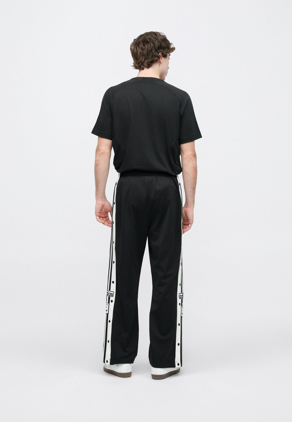 ADIBREAK UNISEX - Tracksuit bottoms - black/white