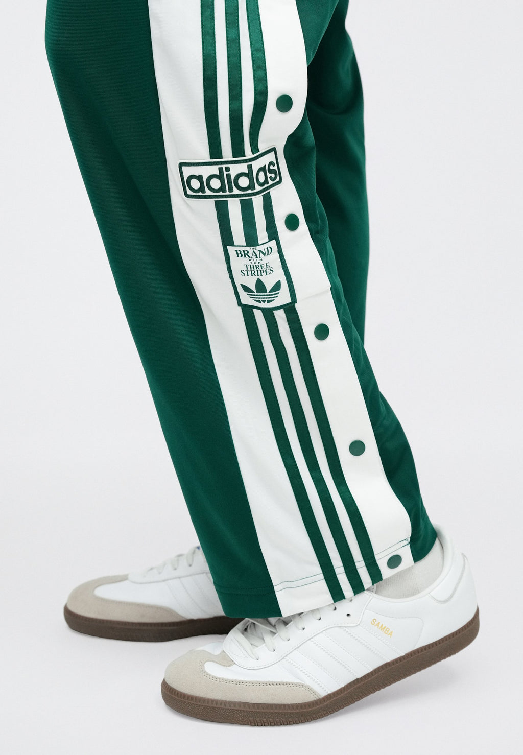 ADIBREAK UNISEX - Tracksuit bottoms - collegiate green