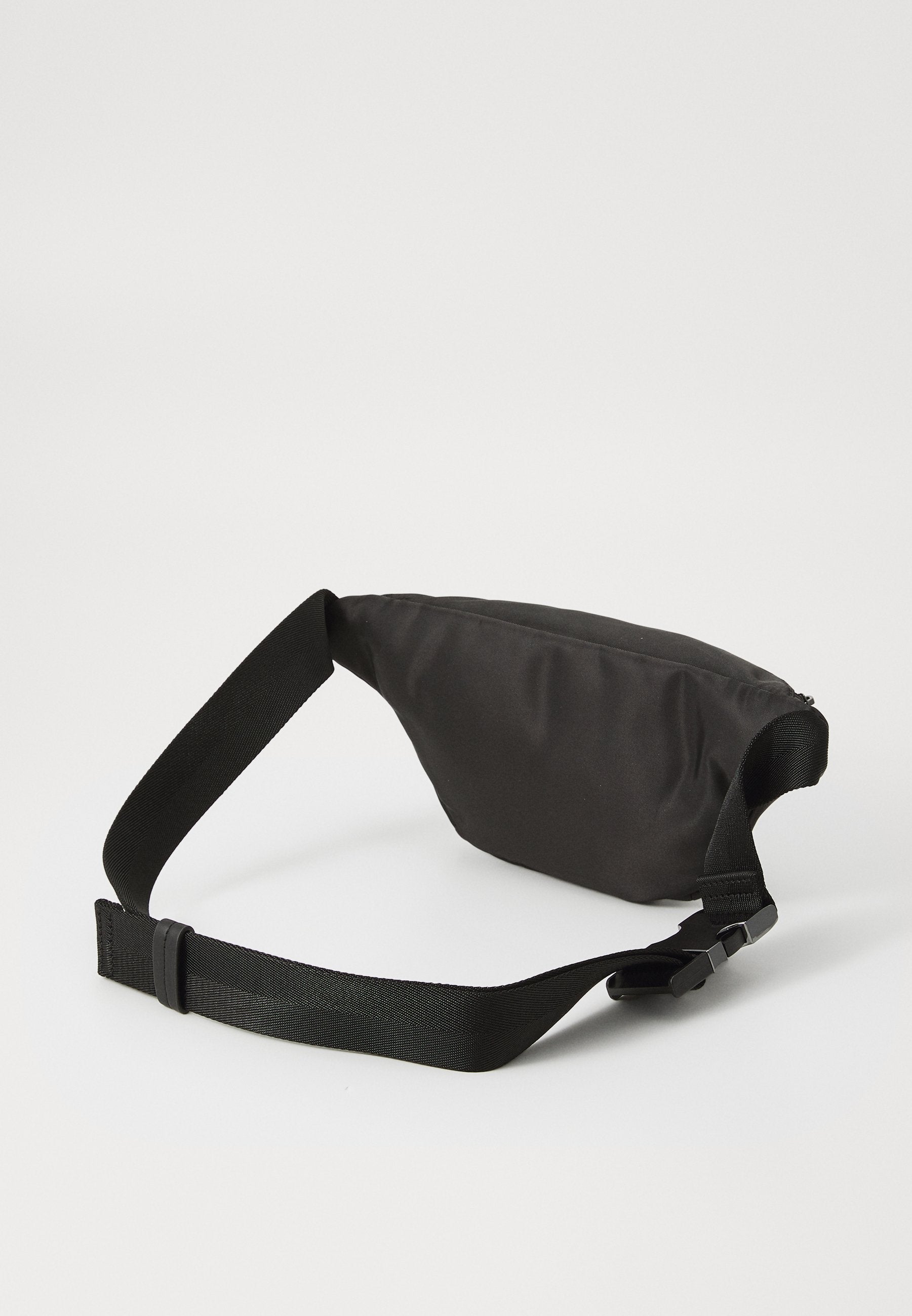 QUANTIC BUMBAG - Cross body bag - black