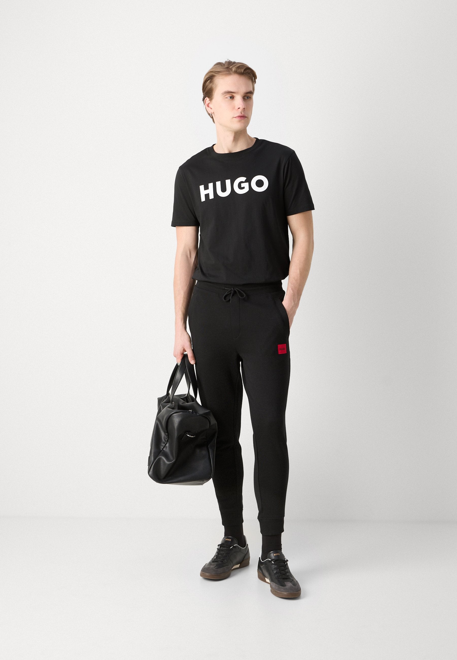 DOAK - Tracksuit bottoms - black