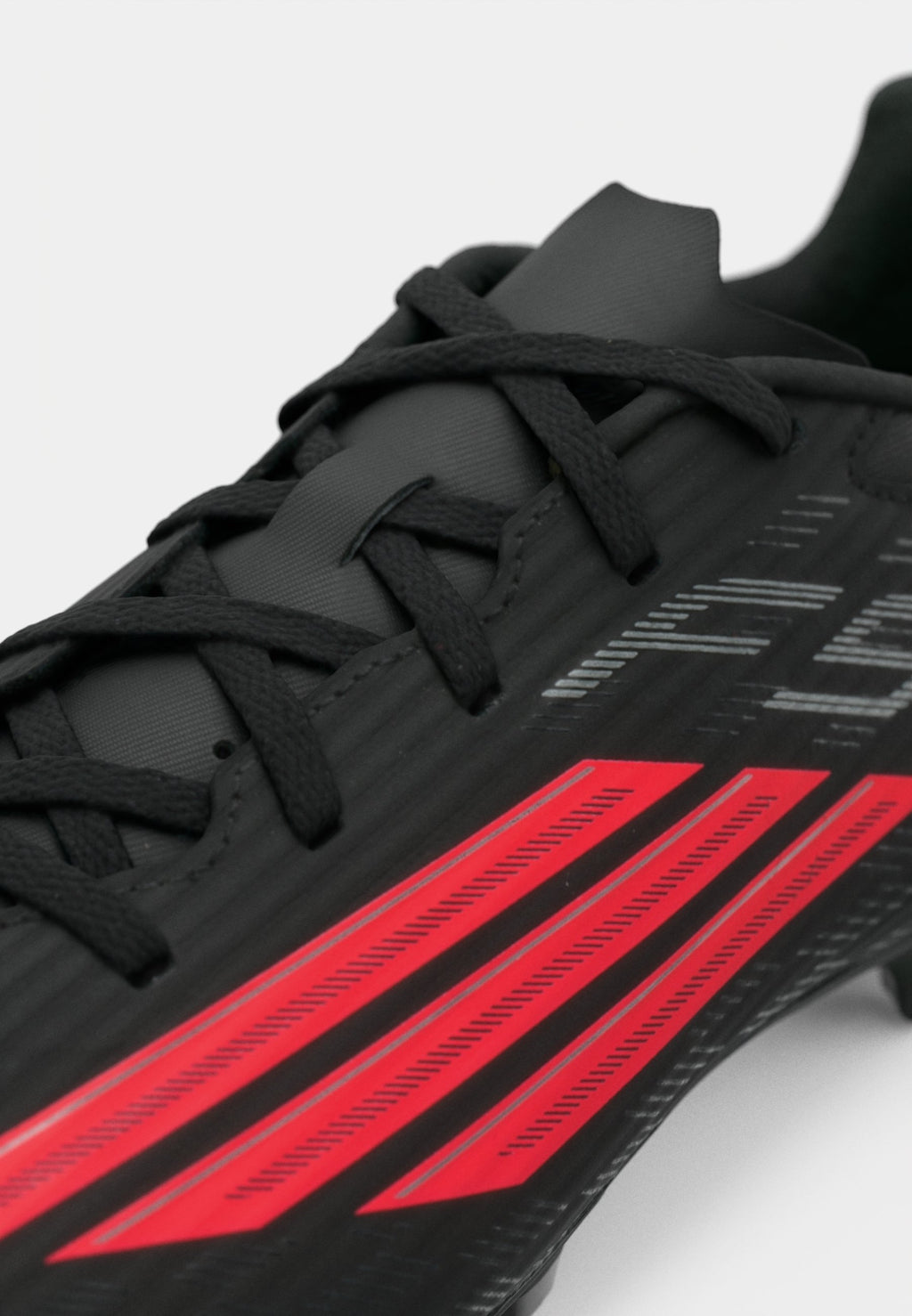 F50 CLUB MULTI - Crampons de foot sur terrain synthétique - core black/lucid red