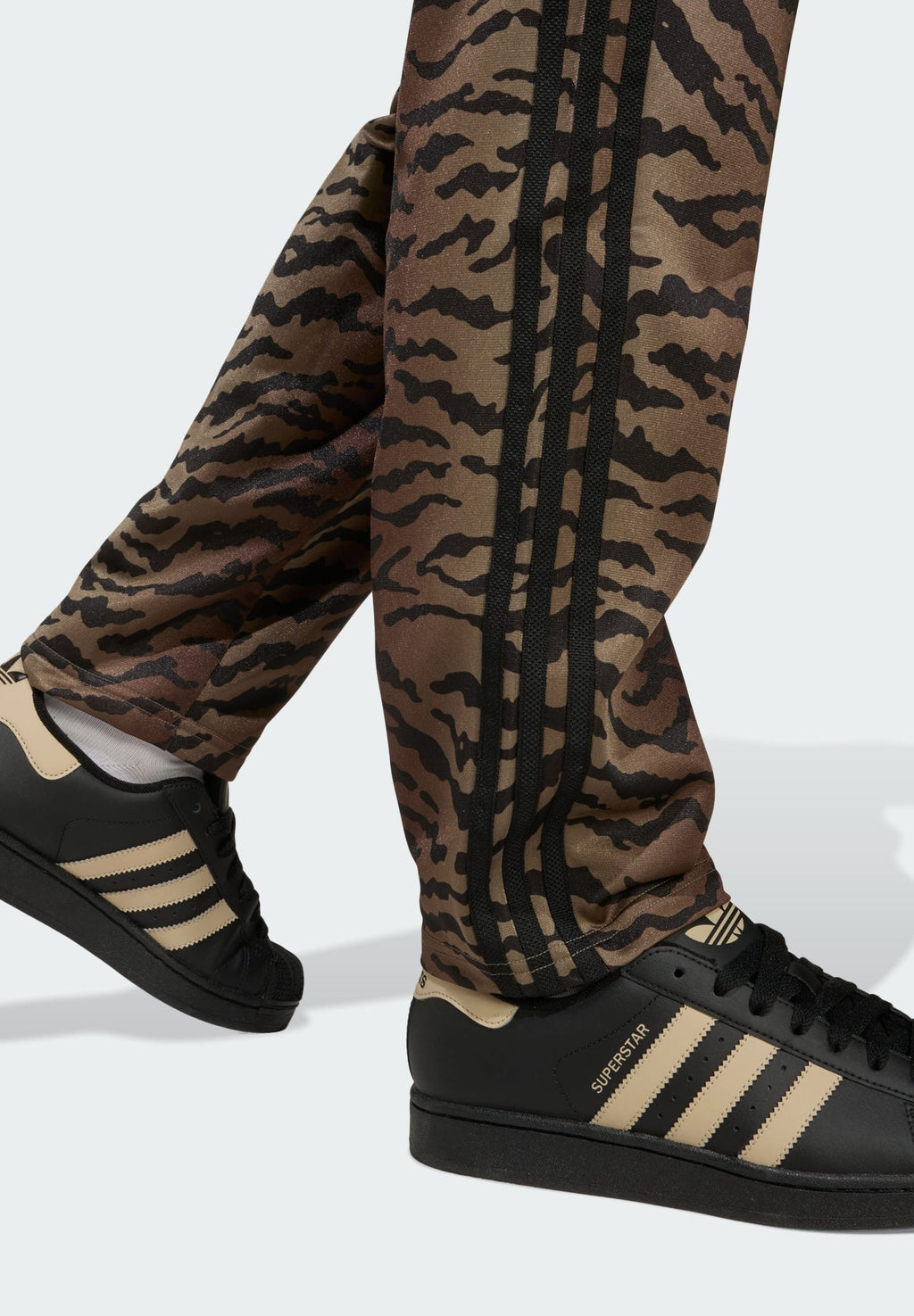 FIREBIRD AOP  - Trousers - night brown