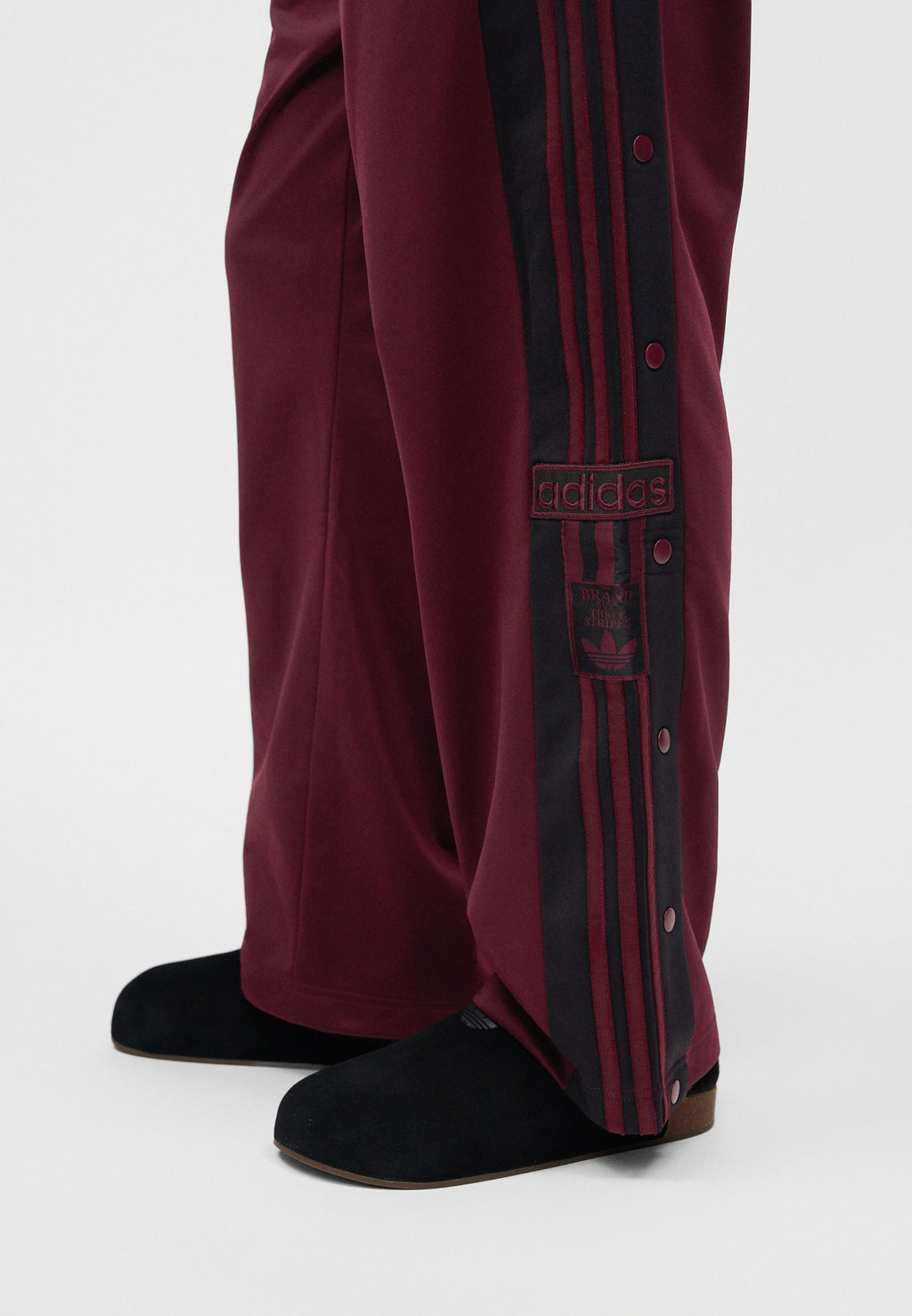ADIBREAK UNISEX - Tracksuit bottoms - maroon