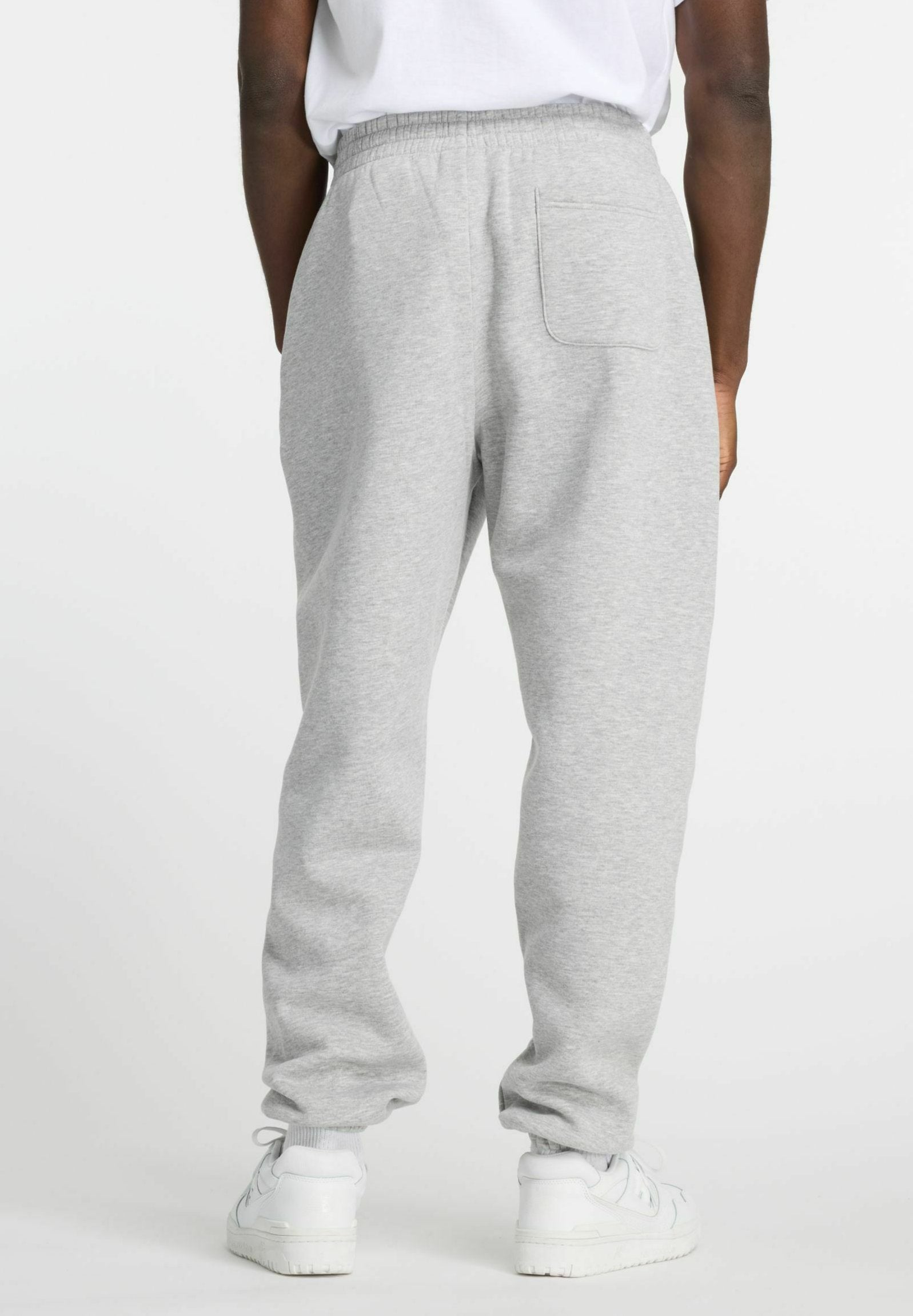 SPORT ESSENTIALS  - Tracksuit bottoms - athletic grey ag