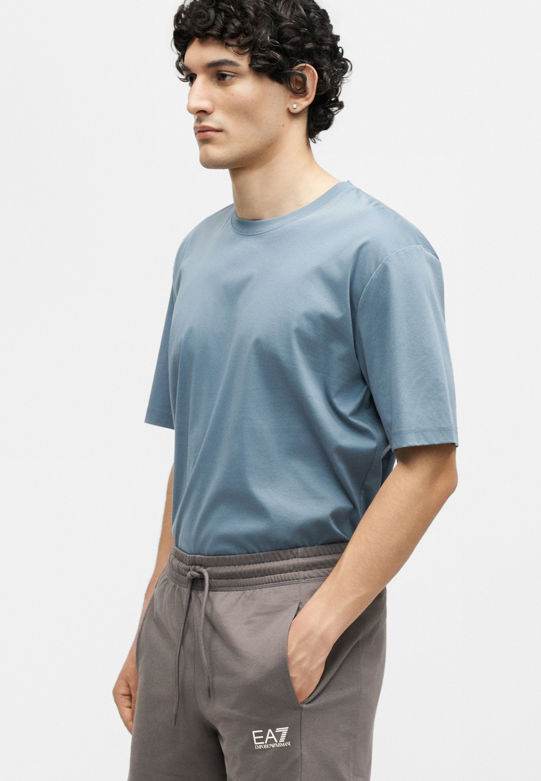 TRAIN CORE - Tracksuit bottoms - smoked pearl
