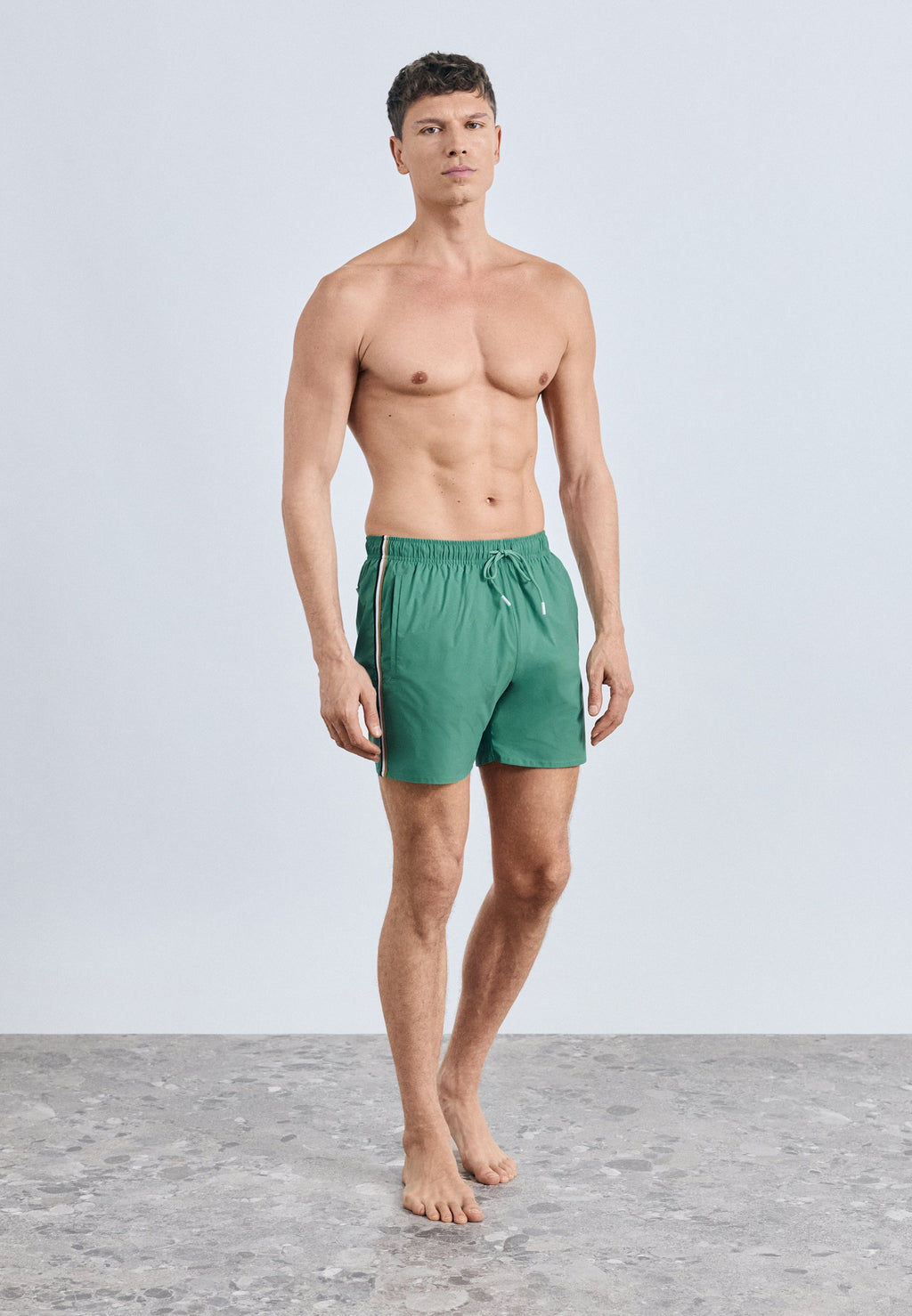 ICONIC - Swimming shorts - open green