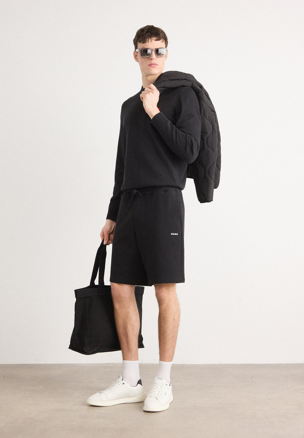 DAYONO - Tracksuit bottoms - black