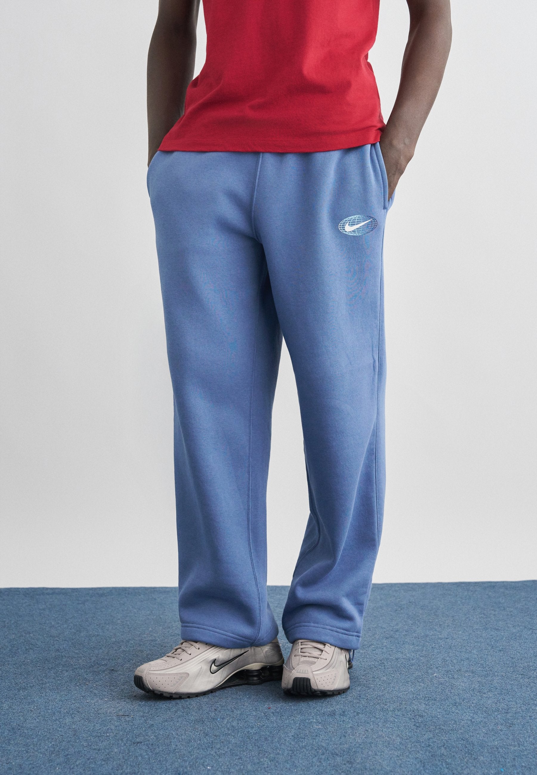 CLUB - Tracksuit bottoms - slate