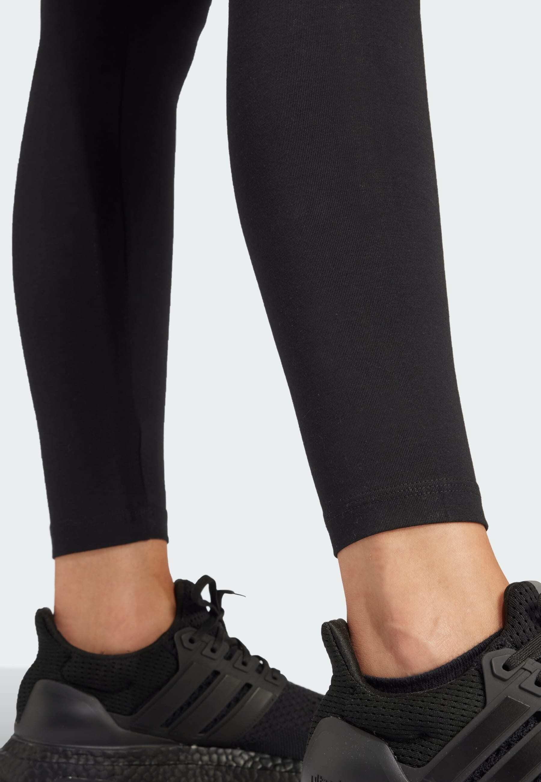 ESSENTIALS LINEAR - Leggings - black/white