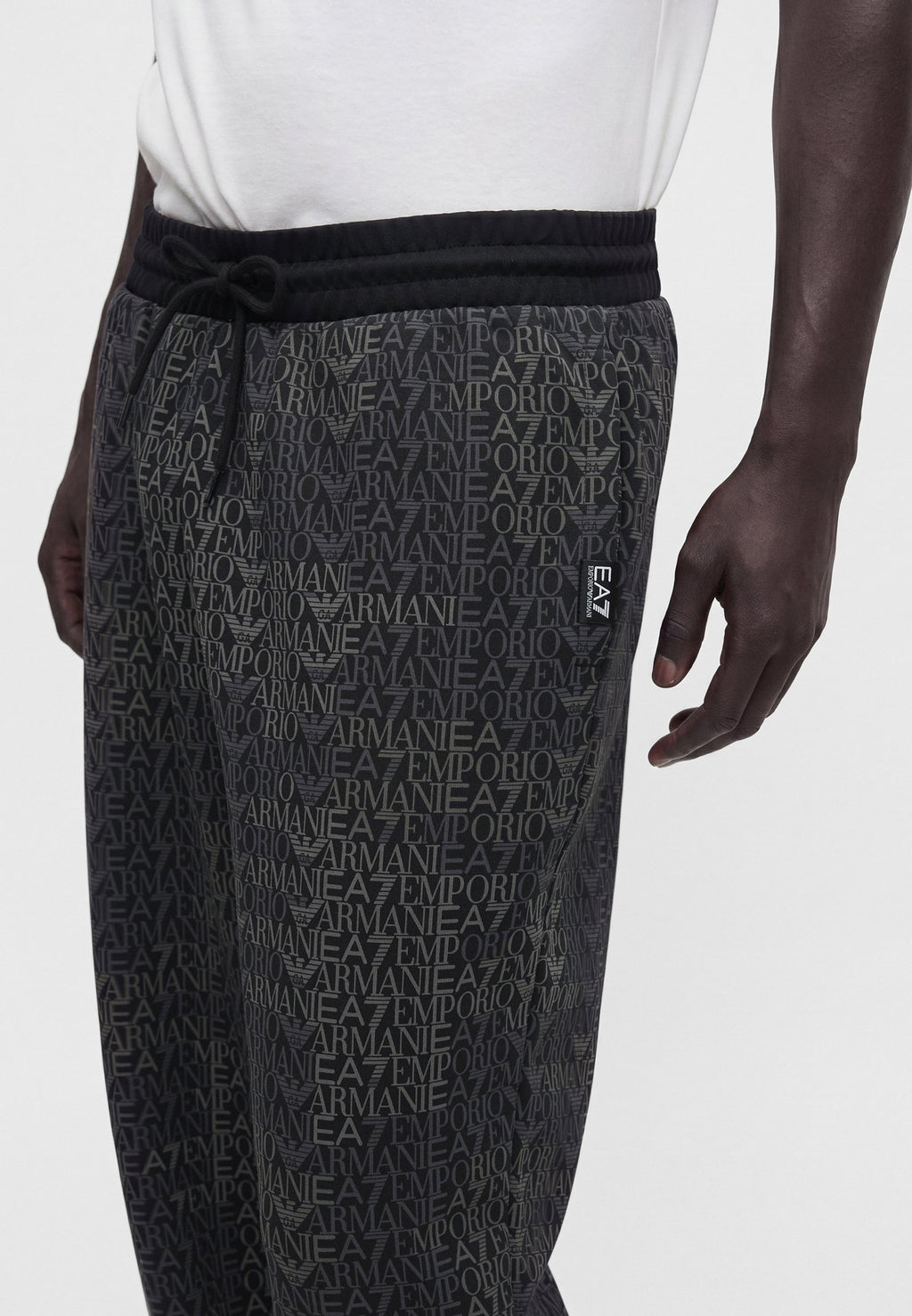 TRAIN LOGO SERIES MONOGRAM - Tracksuit bottoms - black