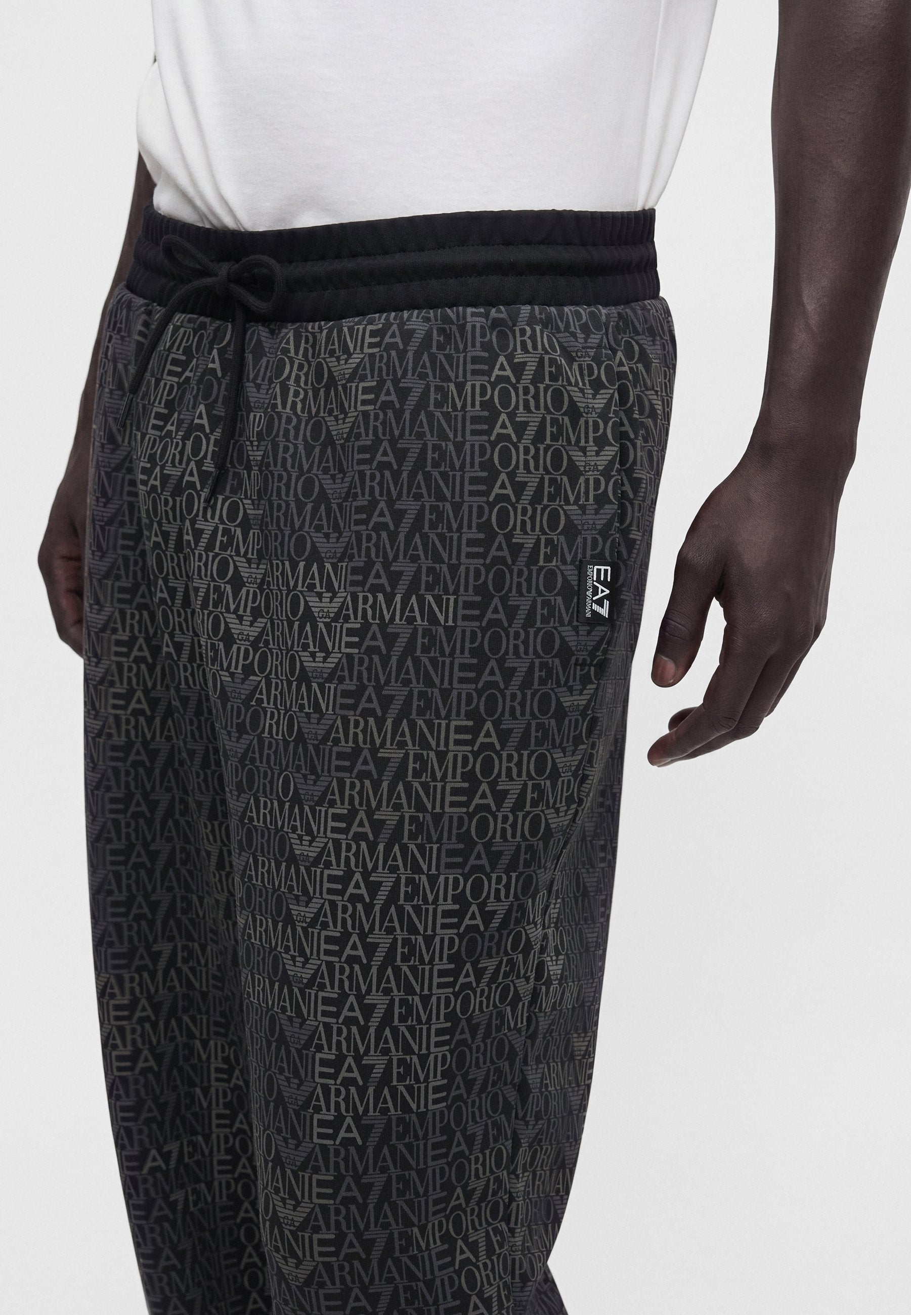 TRAIN LOGO SERIES MONOGRAM - Tracksuit bottoms - black