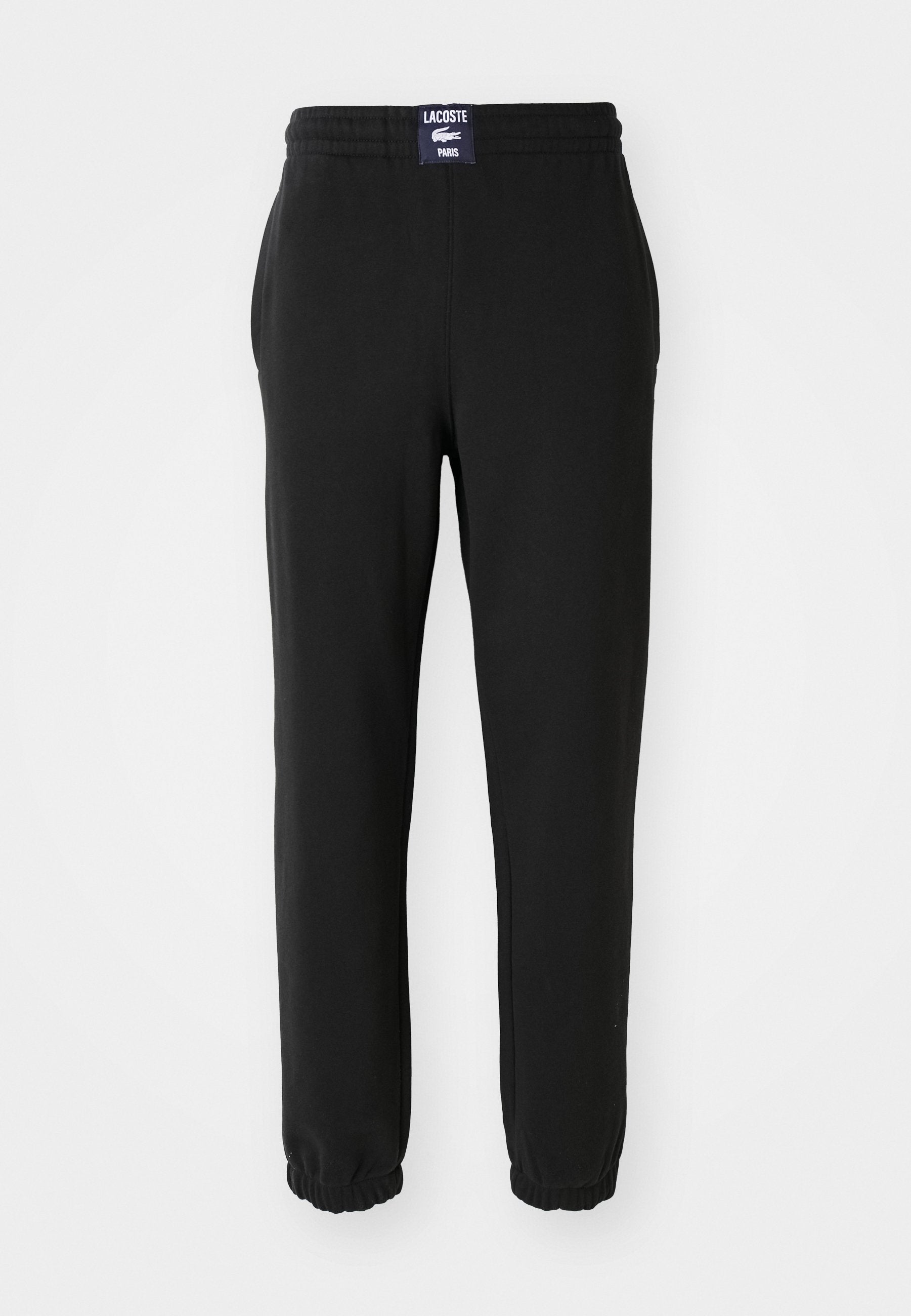 UNISEX - Tracksuit bottoms - black