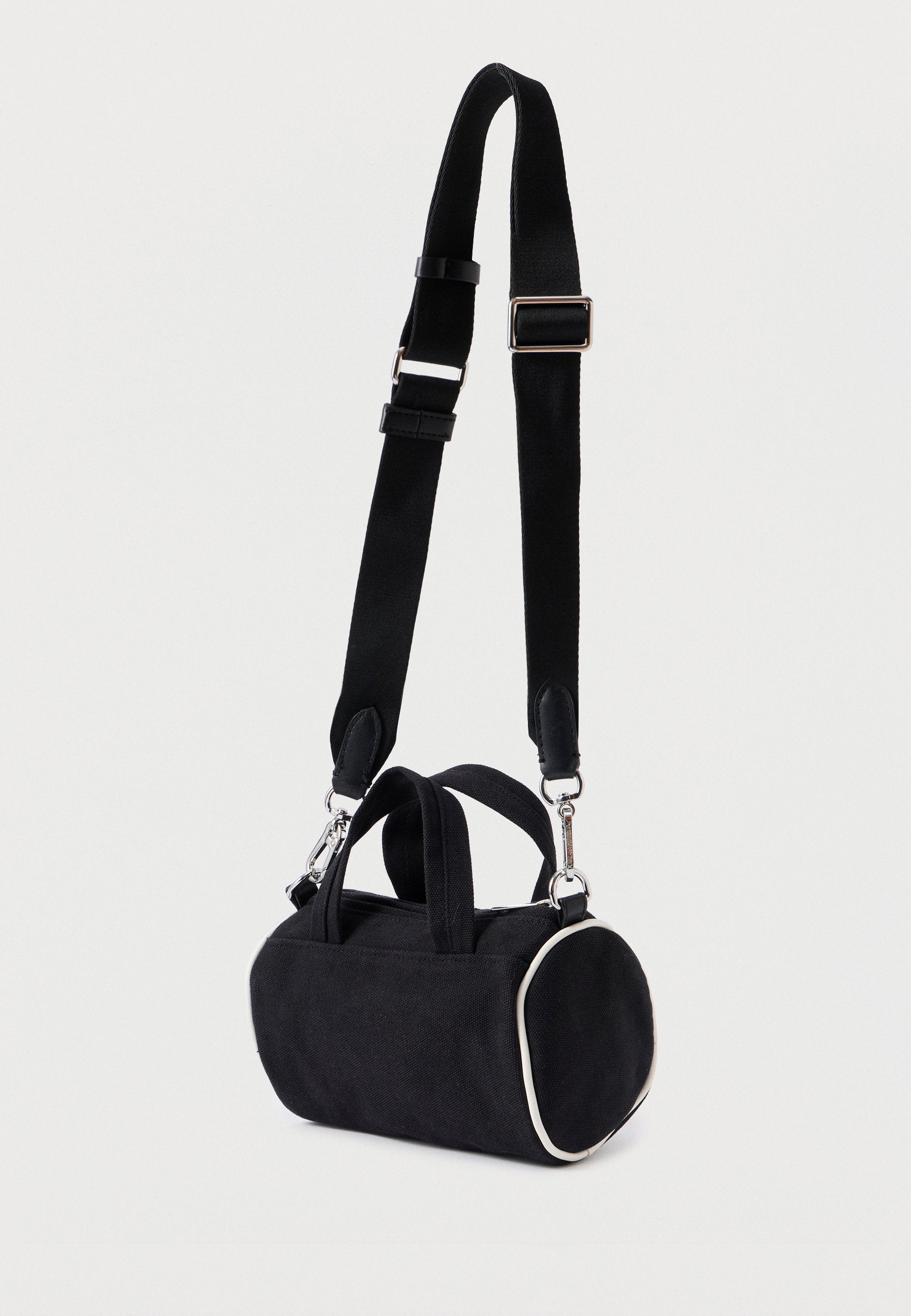 MINI DUFFLE - Handbag - black
