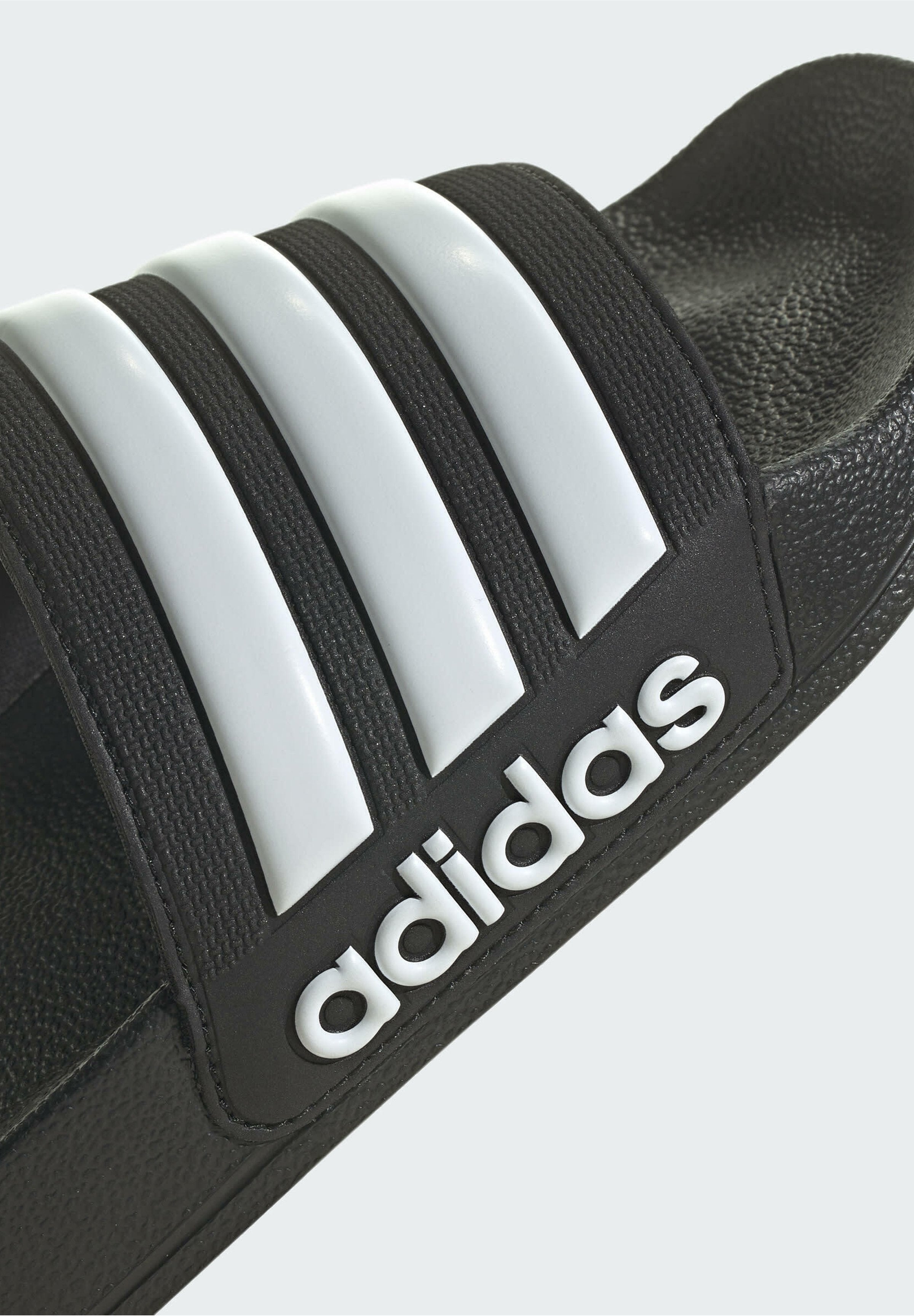 ADILETTE SHOWER - Pool slides - black
