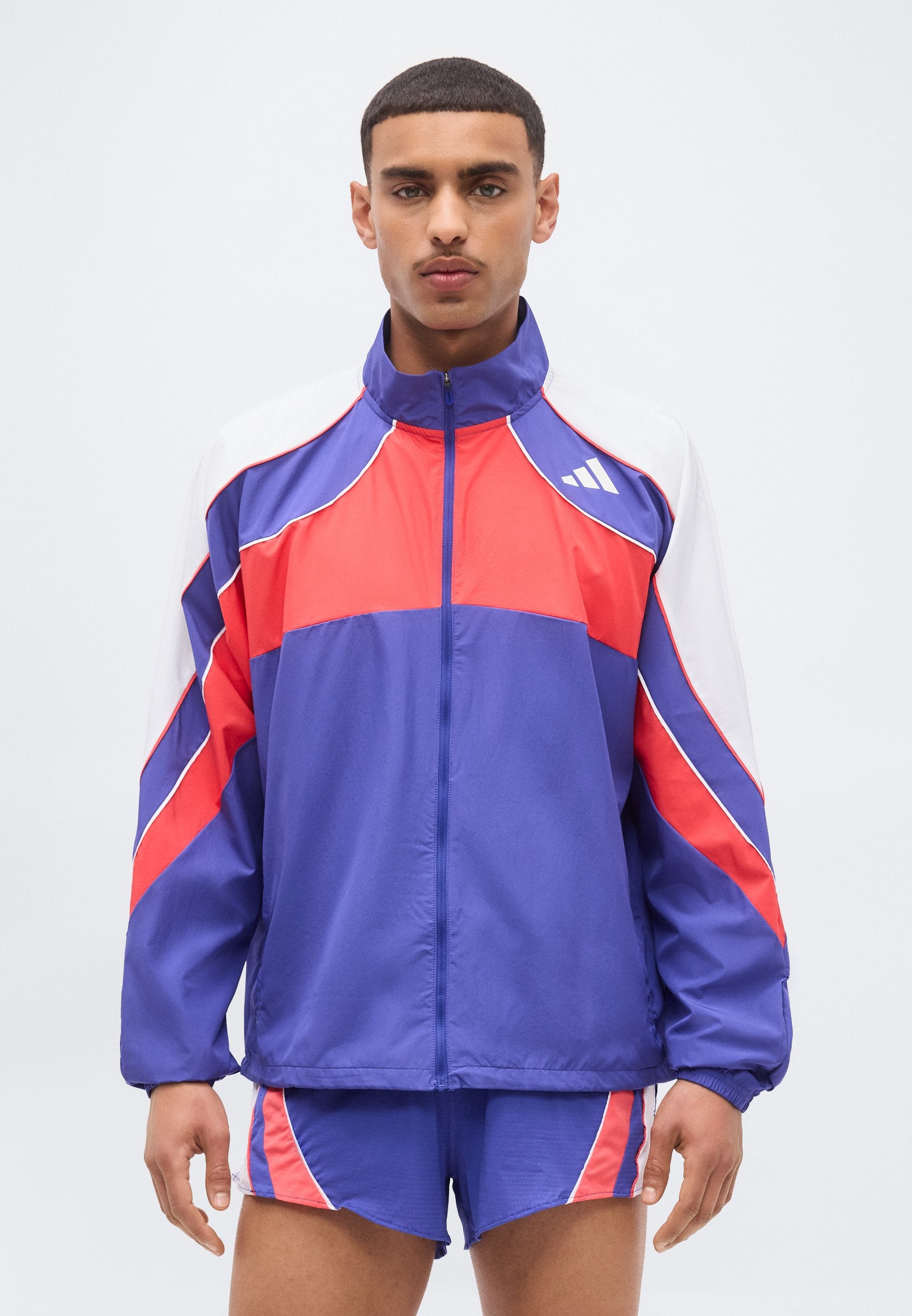 ADIZERO A JKT M - Windbreaker - dual indigo/semi lucid red/white