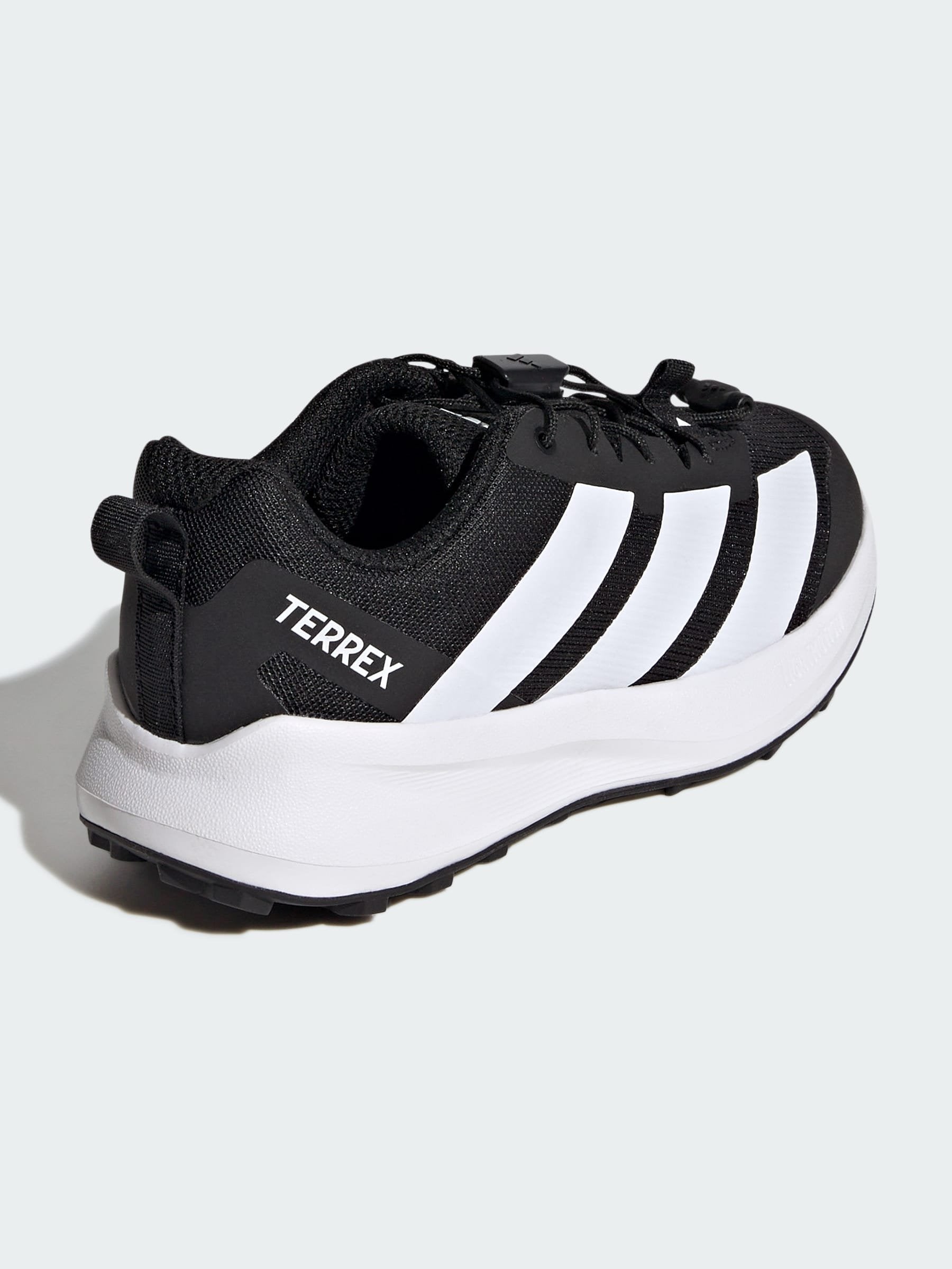 AGRAVIC UNISEX - Trail running shoes - core black/ftwr white/semi impact orange