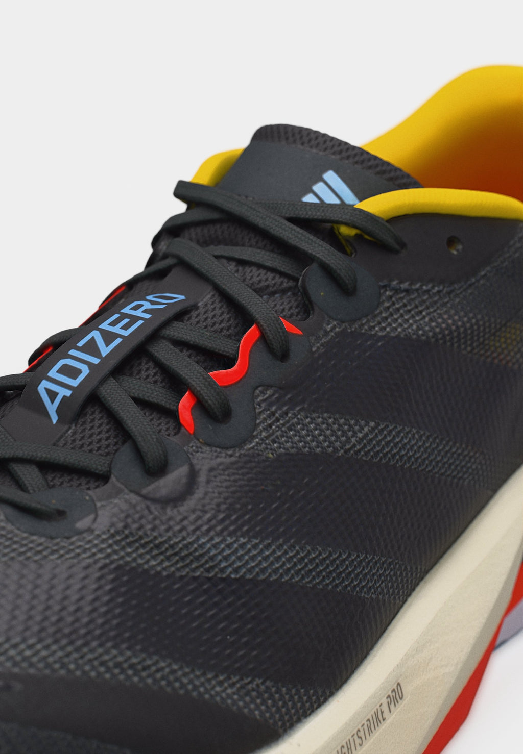 ADIZERO BOSTON 13 M - Road running shoes - carbon/core black/impact orange