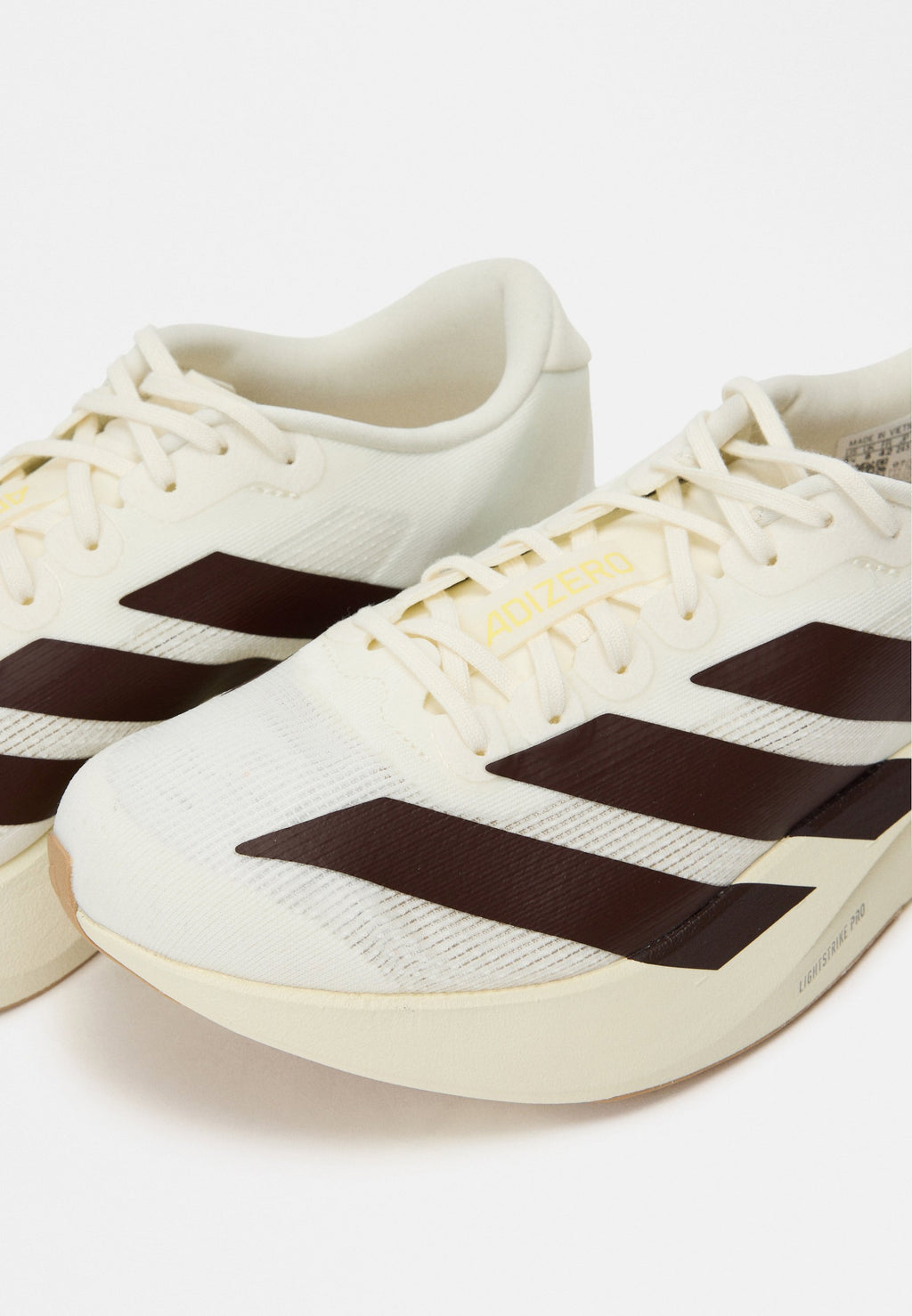ADIZERO EVO SL M - Trainers - off white/shadow brown/almost yellow