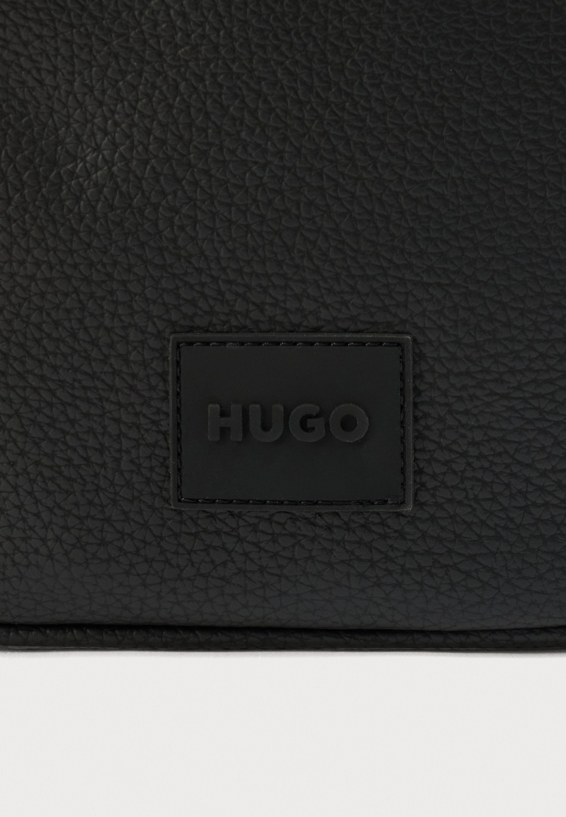 ETHON UNISEX - Cross body bag - black