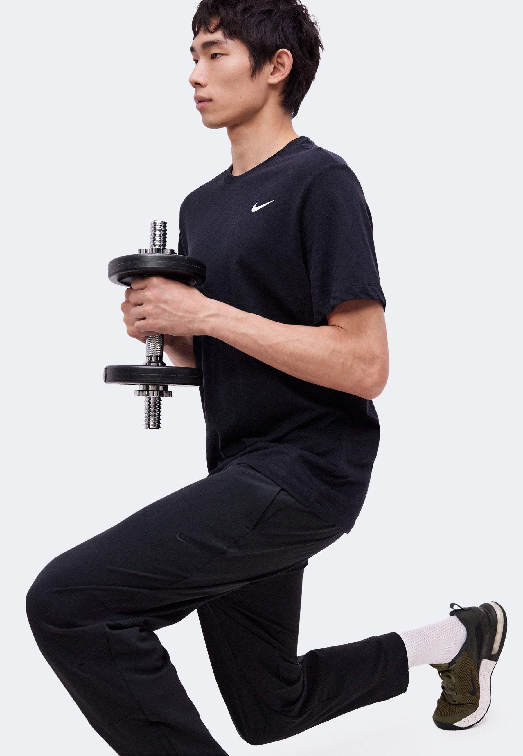 UNLIMITED - Tracksuit bottoms - black