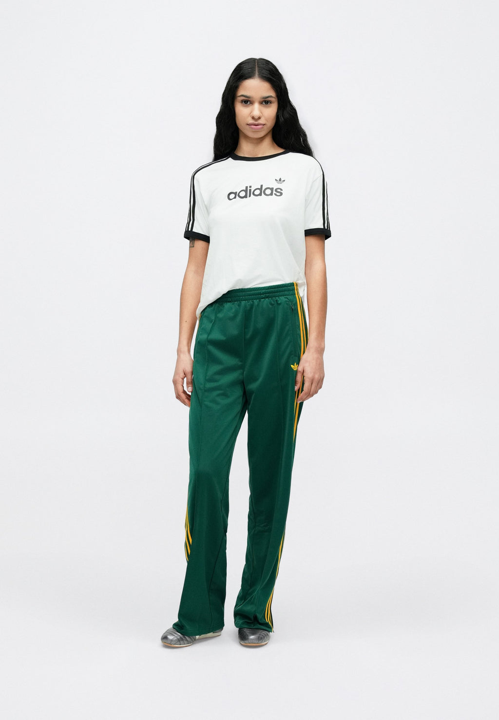 FIREBIRD LOOSE TRACKSUIT PANTS - Tracksuit bottoms - collegiate green/crew yellow