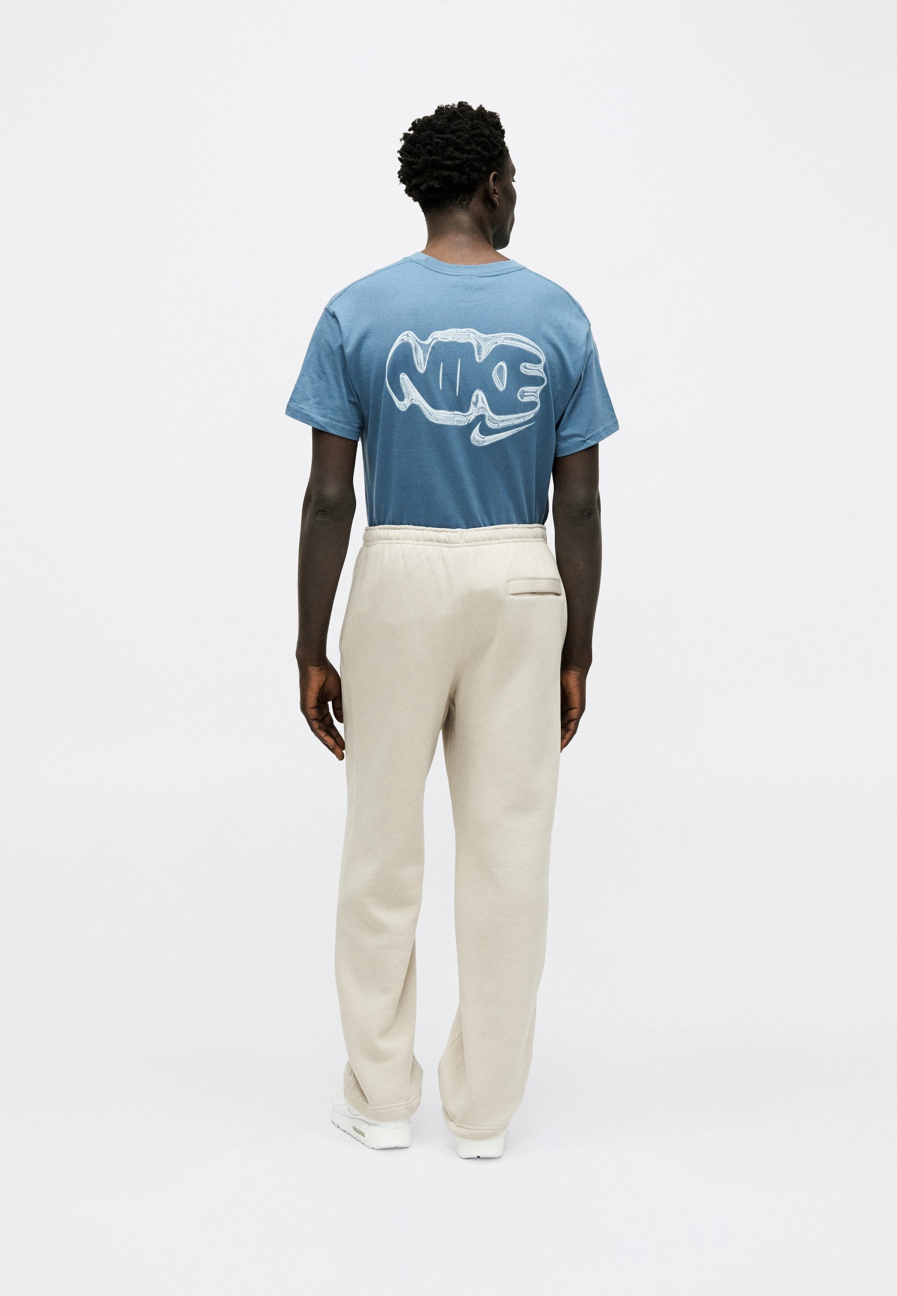CLUB - Tracksuit bottoms - cream